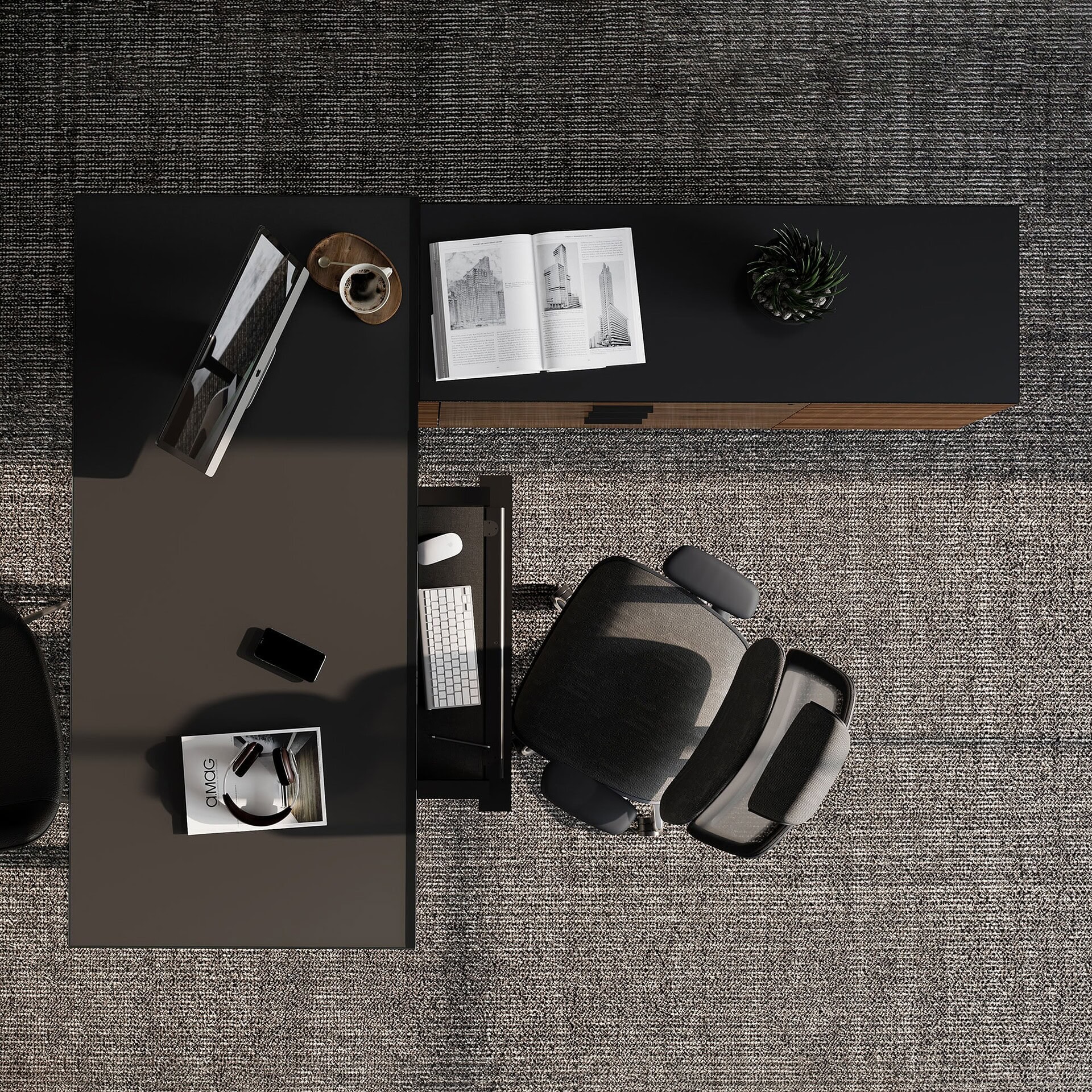 Modern black office desk with computer, keyboard, and office supplies.