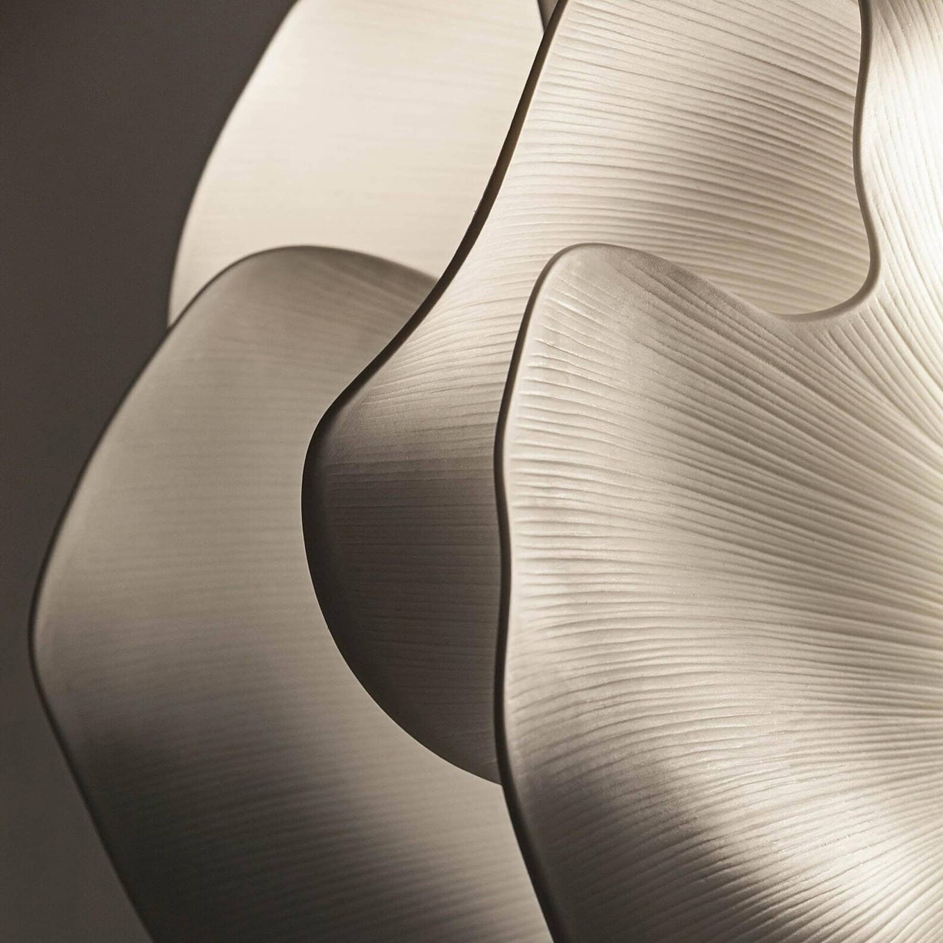 Close-up of porcelain petals on the Nightbloom Floor Lamp showing sculptural detail.
