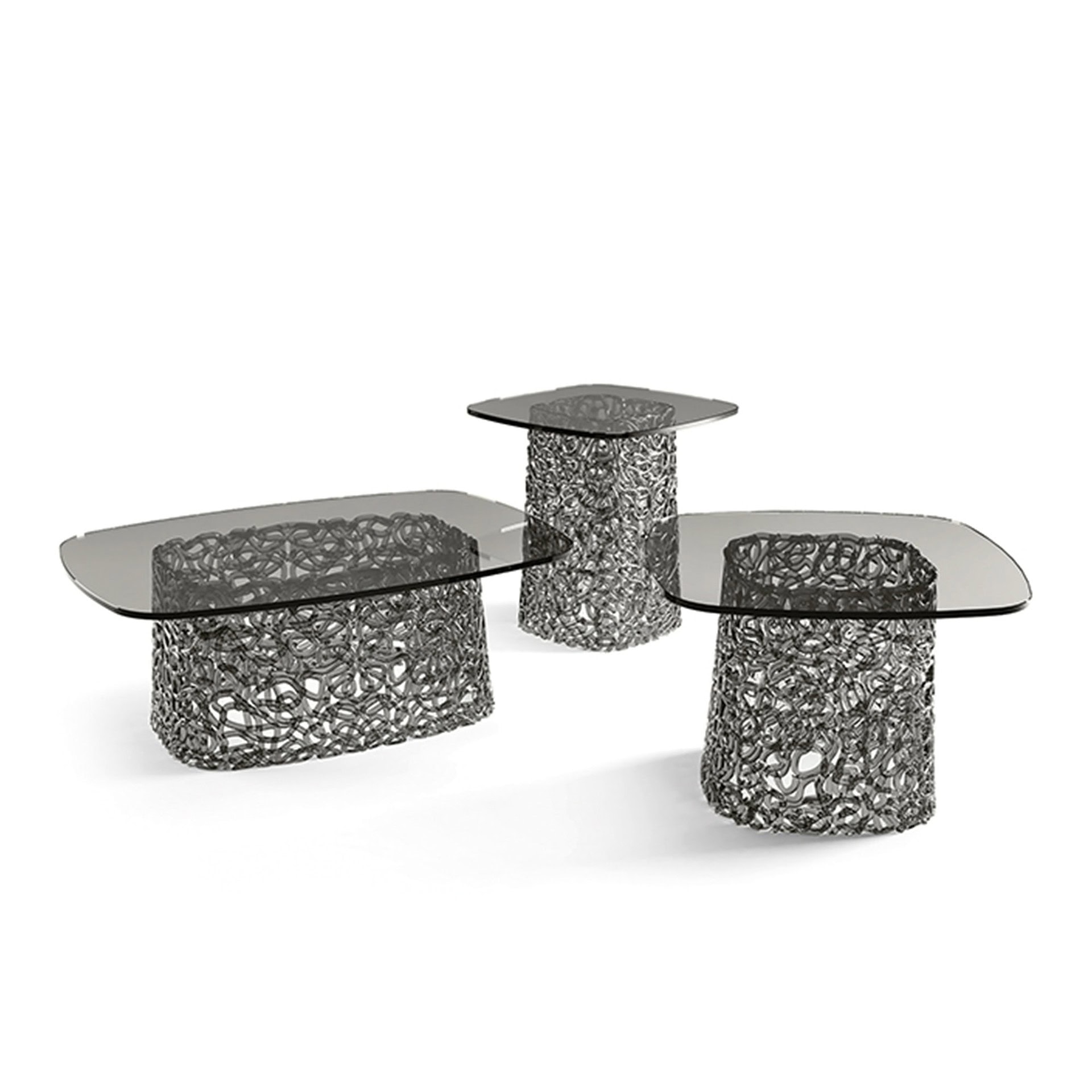 Set of Macramè Coffee Tables in fumè grey glass finish in three sizes, studio view