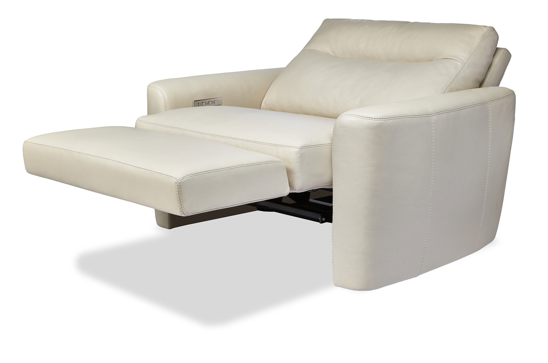 Luxurious white leather reclining sofa with extendable footrest for modern living rooms.