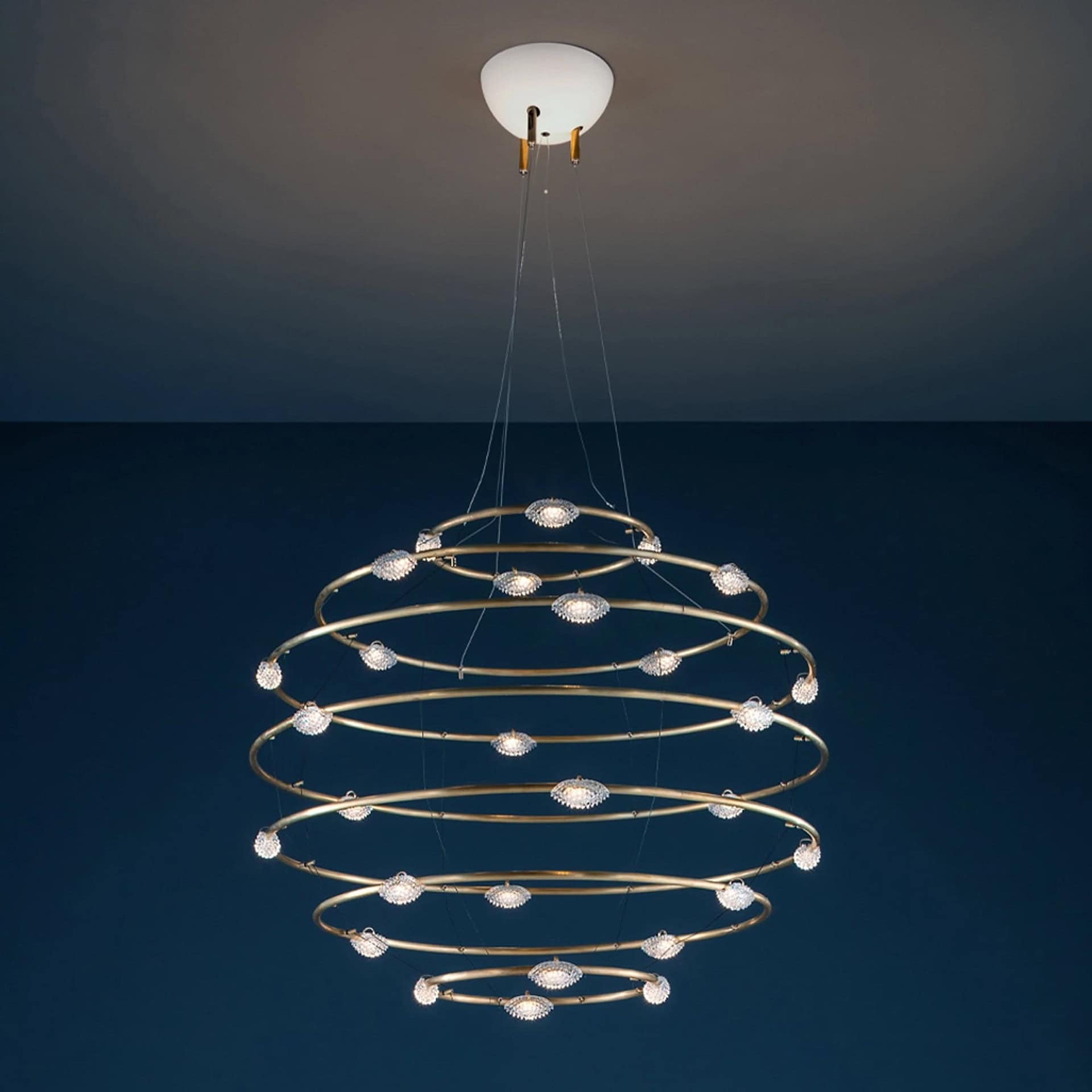 LED chandelier with circular rings and integrated lighting.
