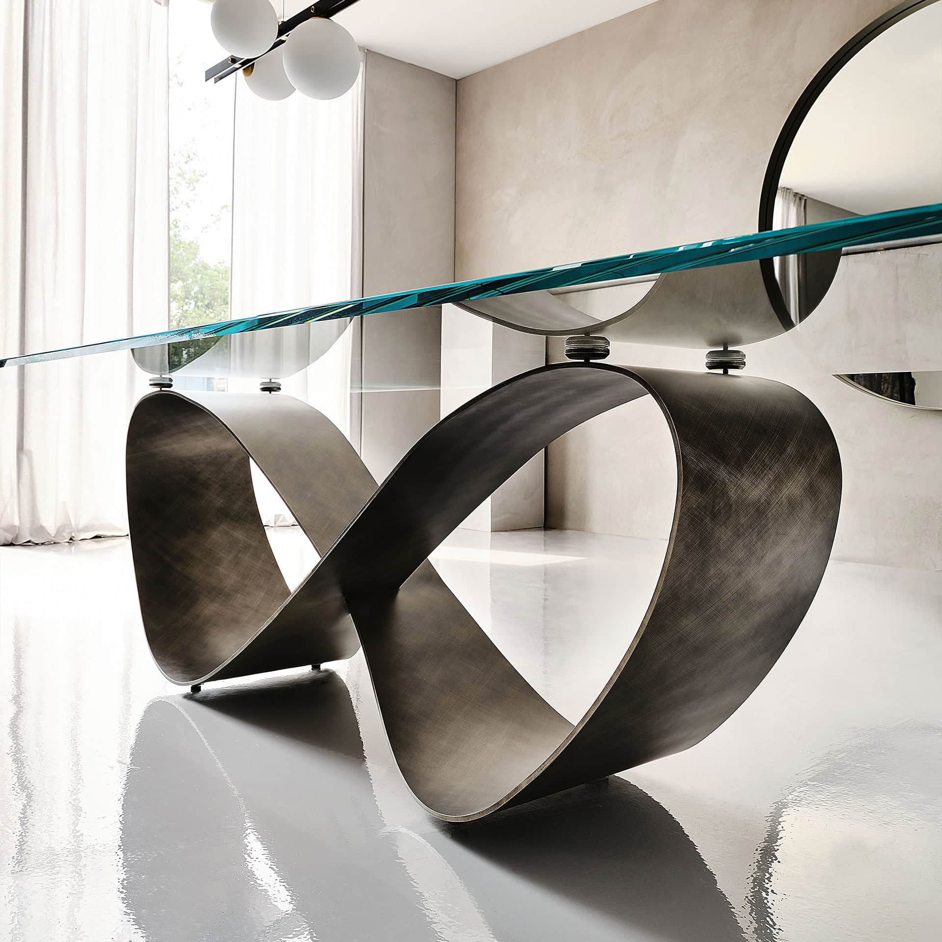 Elegant butterfly-shaped sculptural dining table with a glass top and modern design.