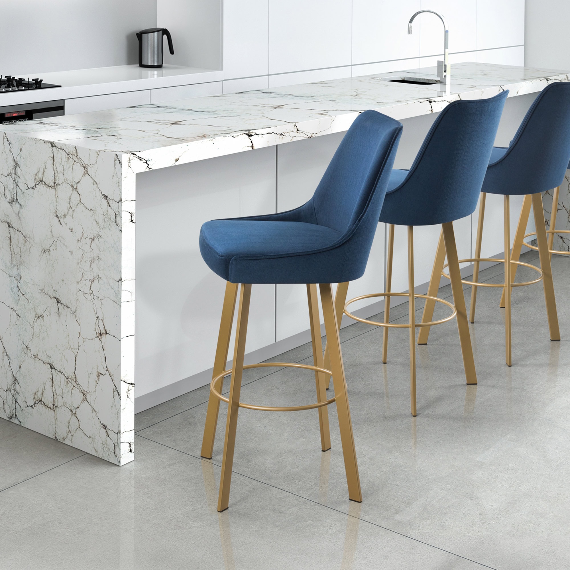 Olivia swivel bar stool with blue upholstery and wooden legs at a contemporary kitchen island.