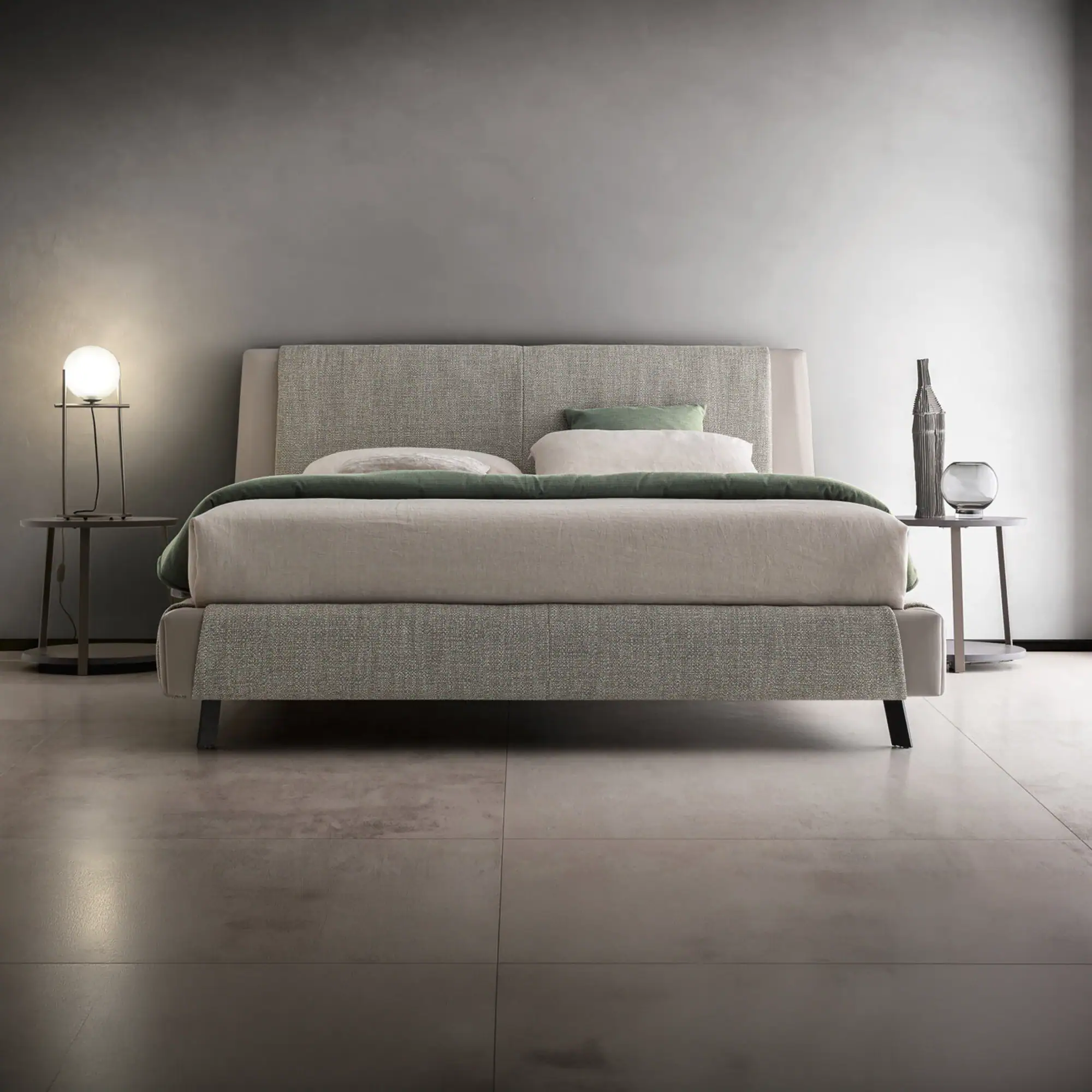 Sklar Furnishings bed with neutral upholstered headboard in a modern bedroom.