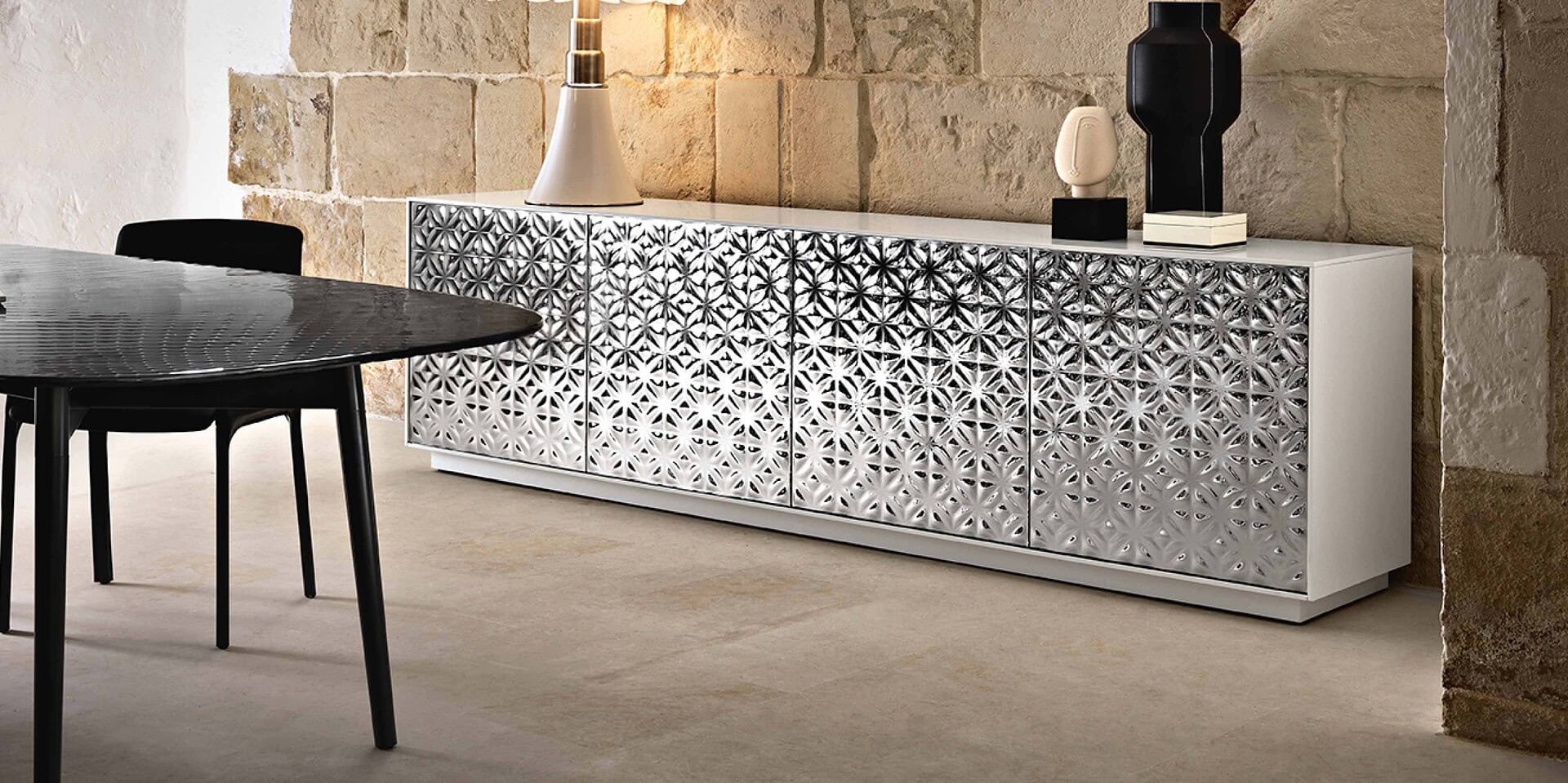 Sleek modern sideboard with geometric silver design, perfect for contemporary living spaces.
