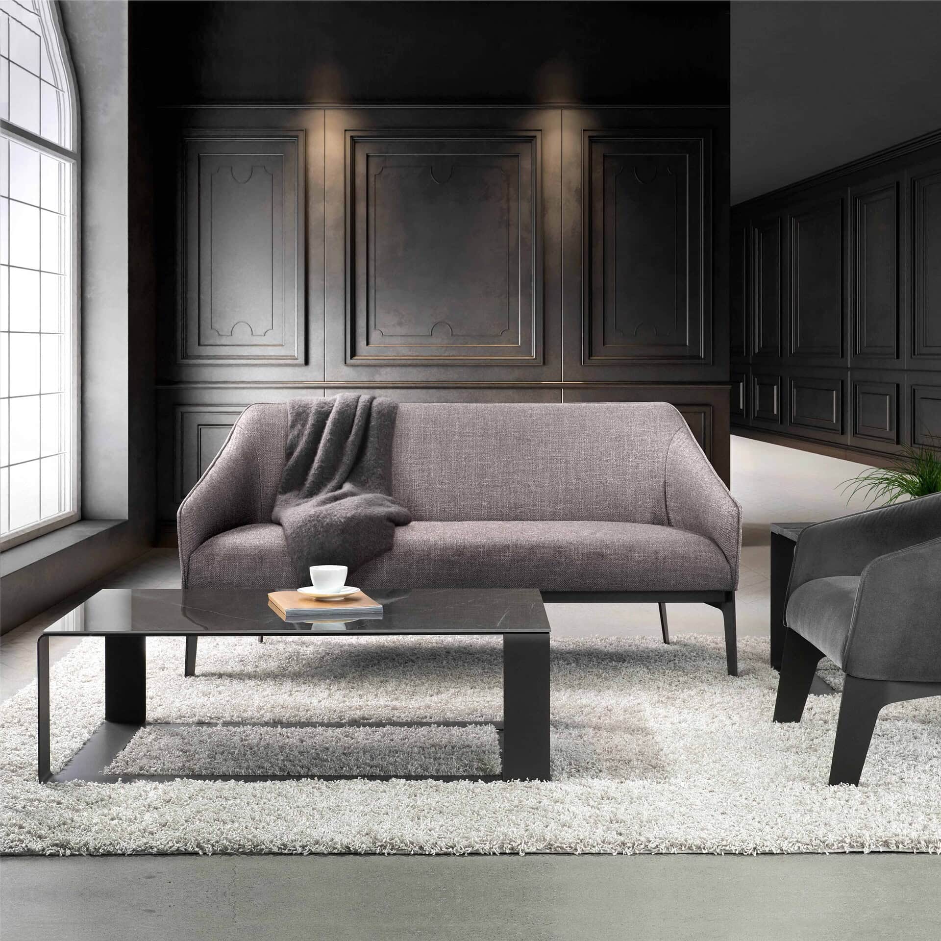 Sofa with dark wood wall paneling and contemporary coffee table in modern living room.
