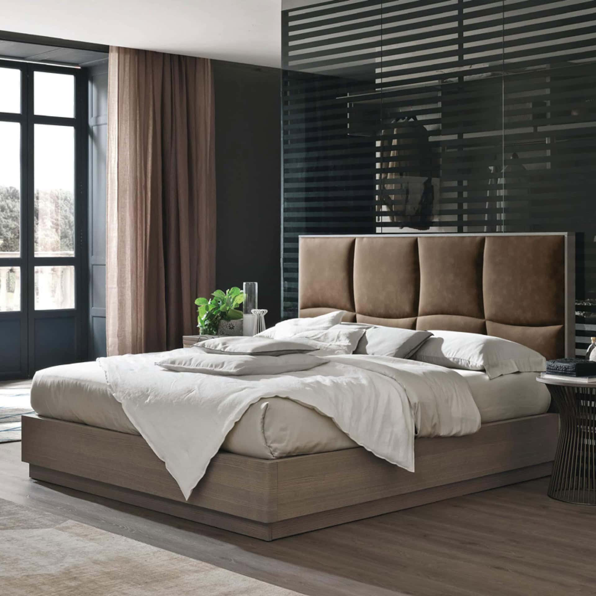Luxurious modern bedroom with upholstered headboard and natural wood bed frame, stylish decor.