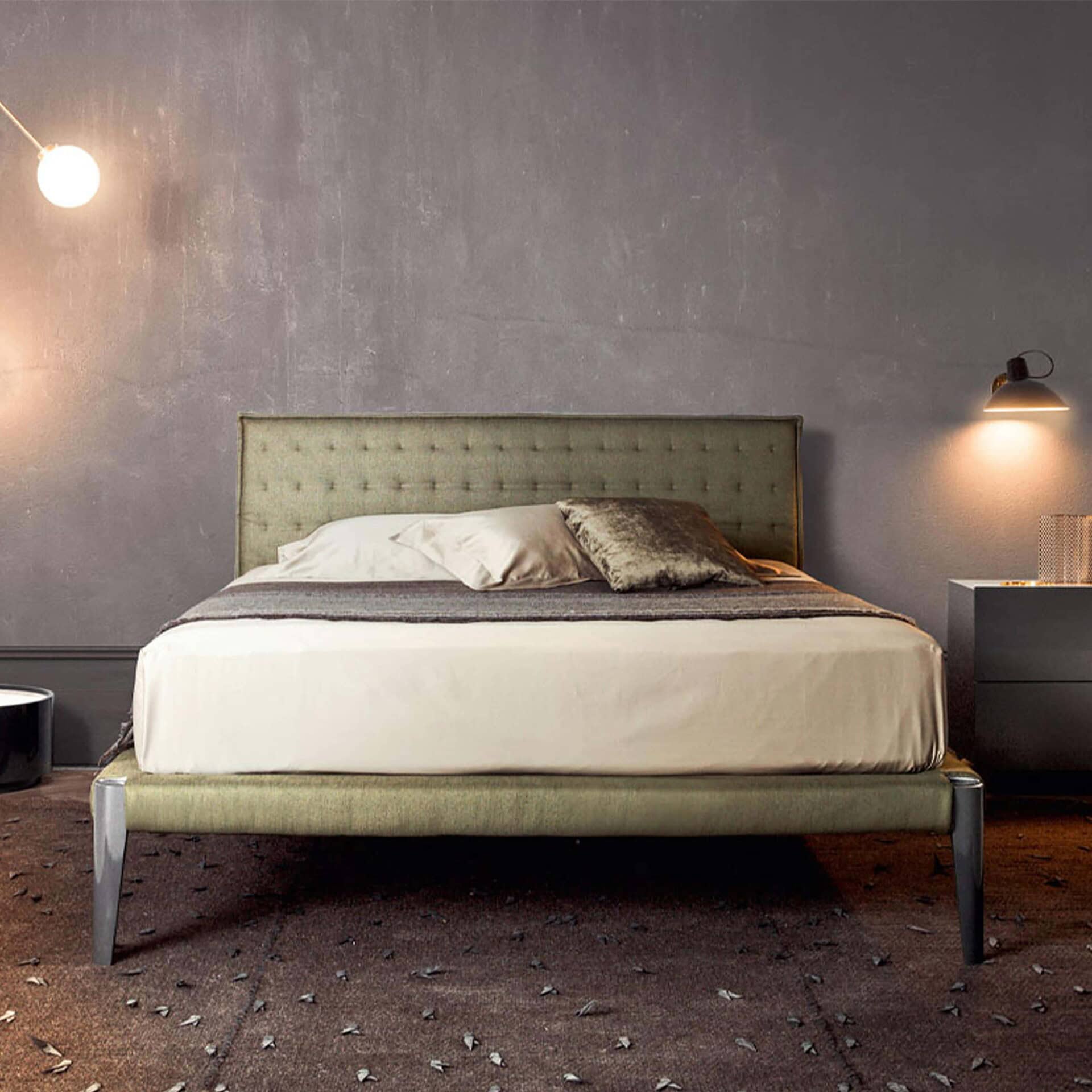 Luxurious modern bedroom with green upholstered bed, stylish design, bedroom furniture, and contemporary decor.