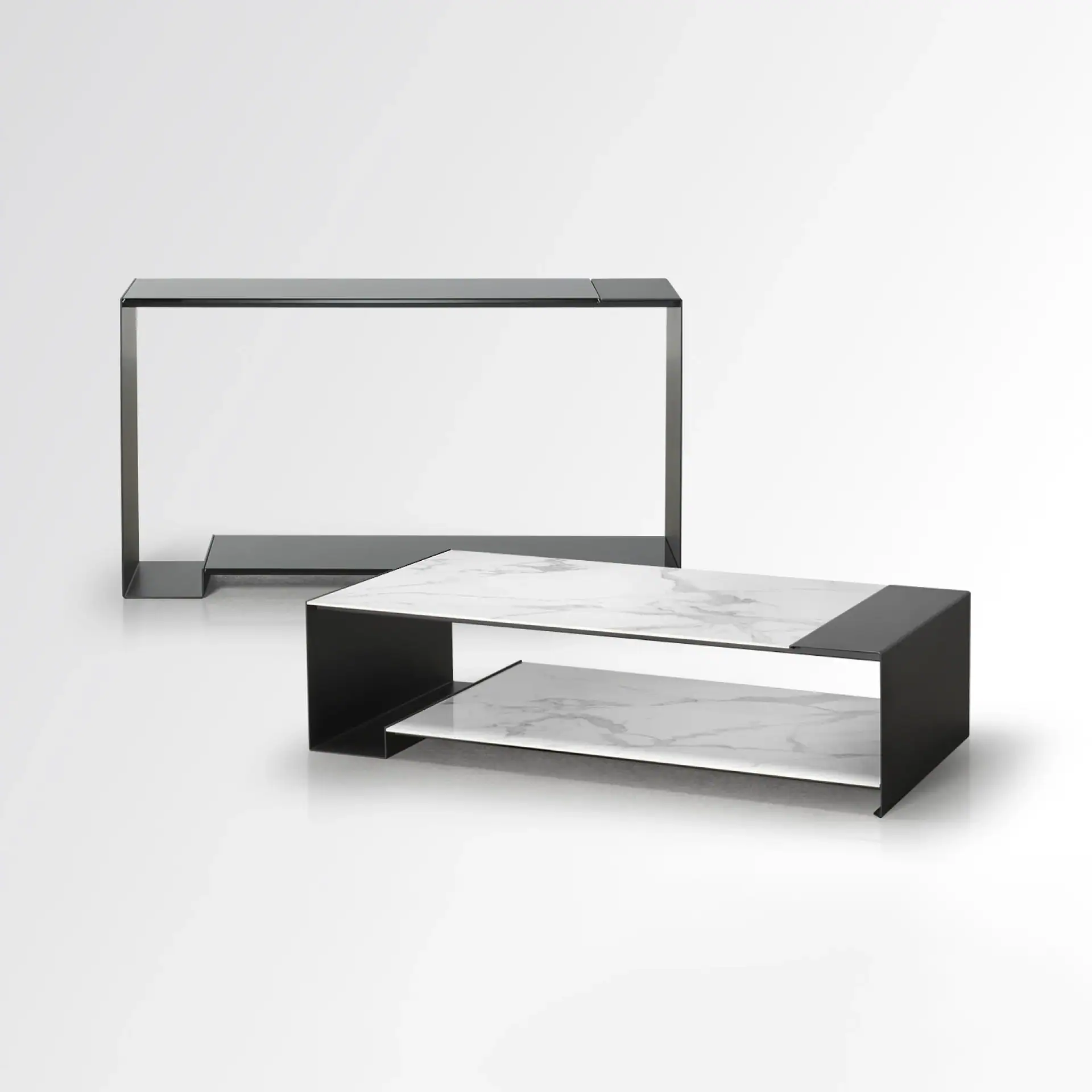 Duo Table by Sklar Furnishings with marble top and black metal frame.
