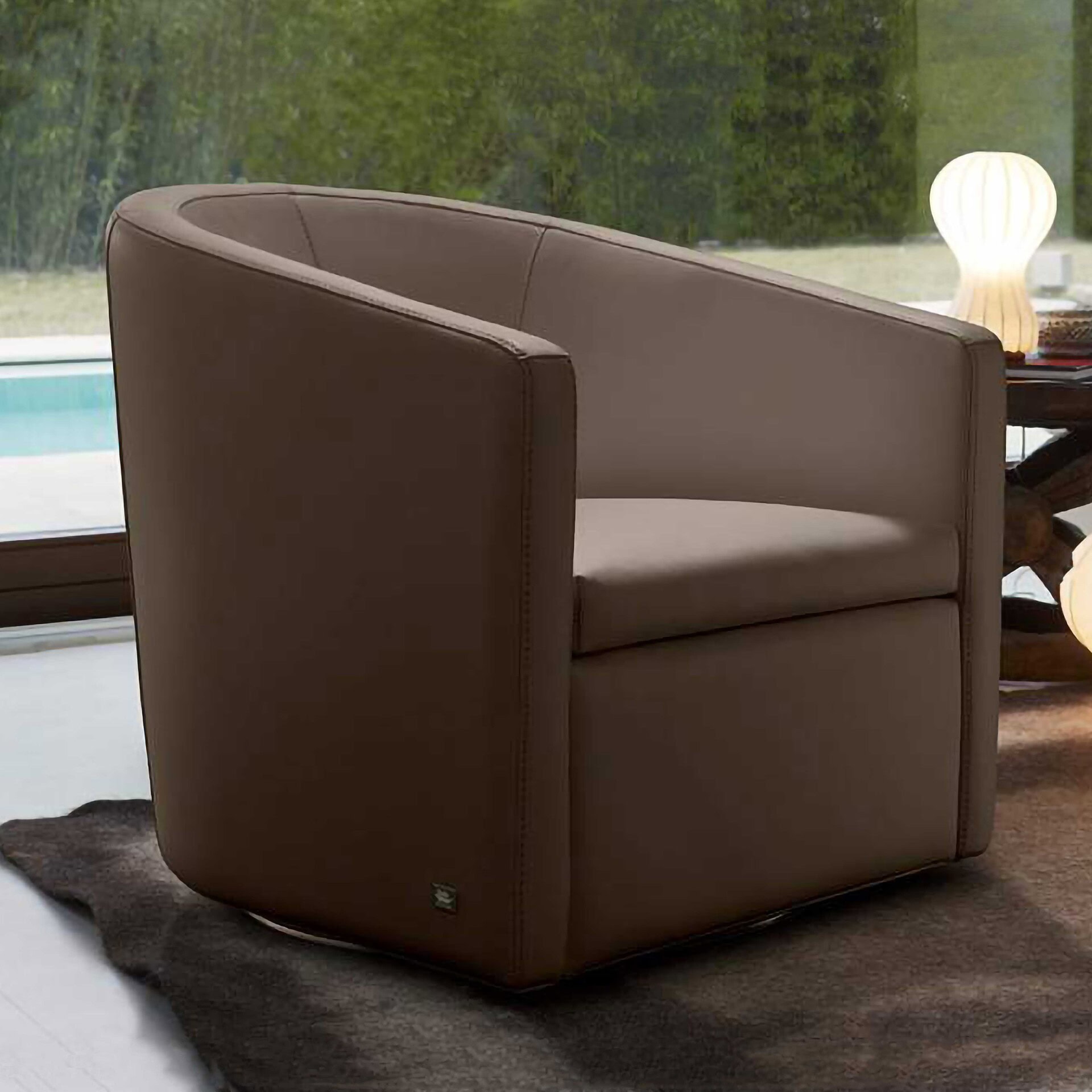 Elegant brown leather armchair for luxurious home decor.
