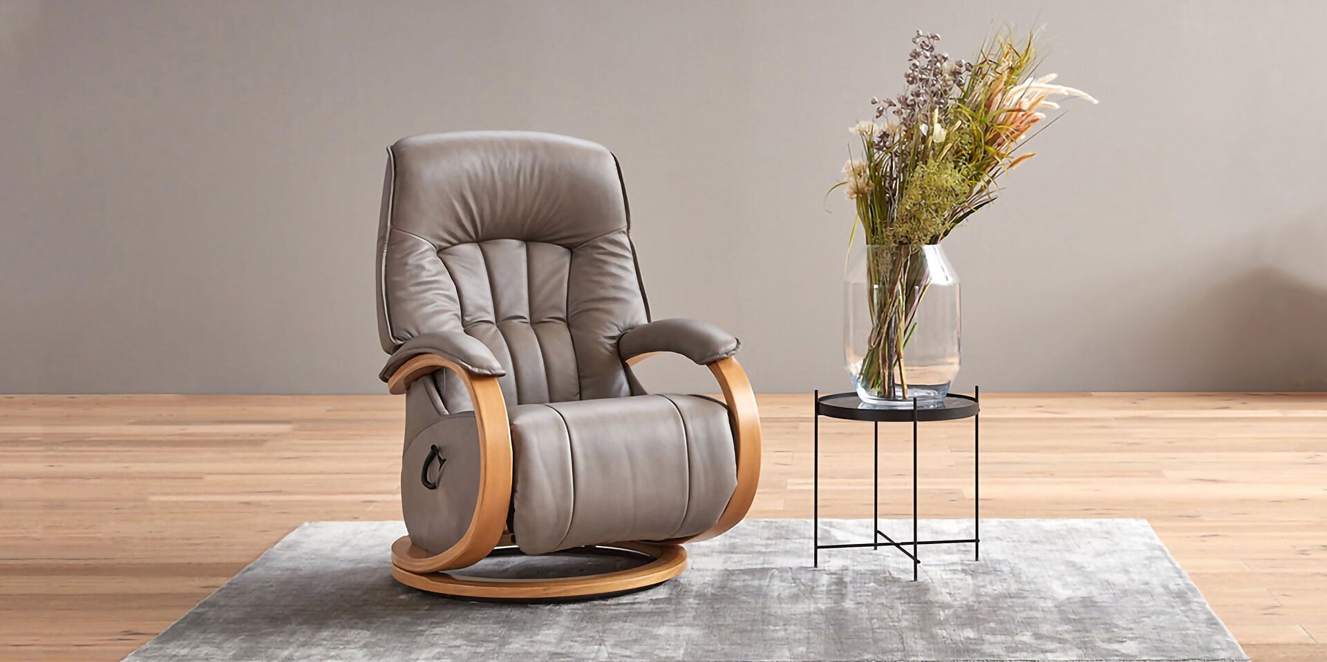Comfortable leather recliner with wooden armrests and modern design.