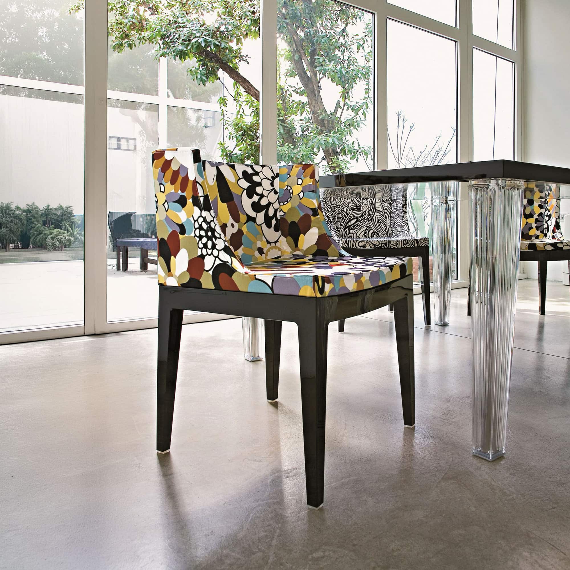 Elegant floral patterned dining armchair for modern interiors.