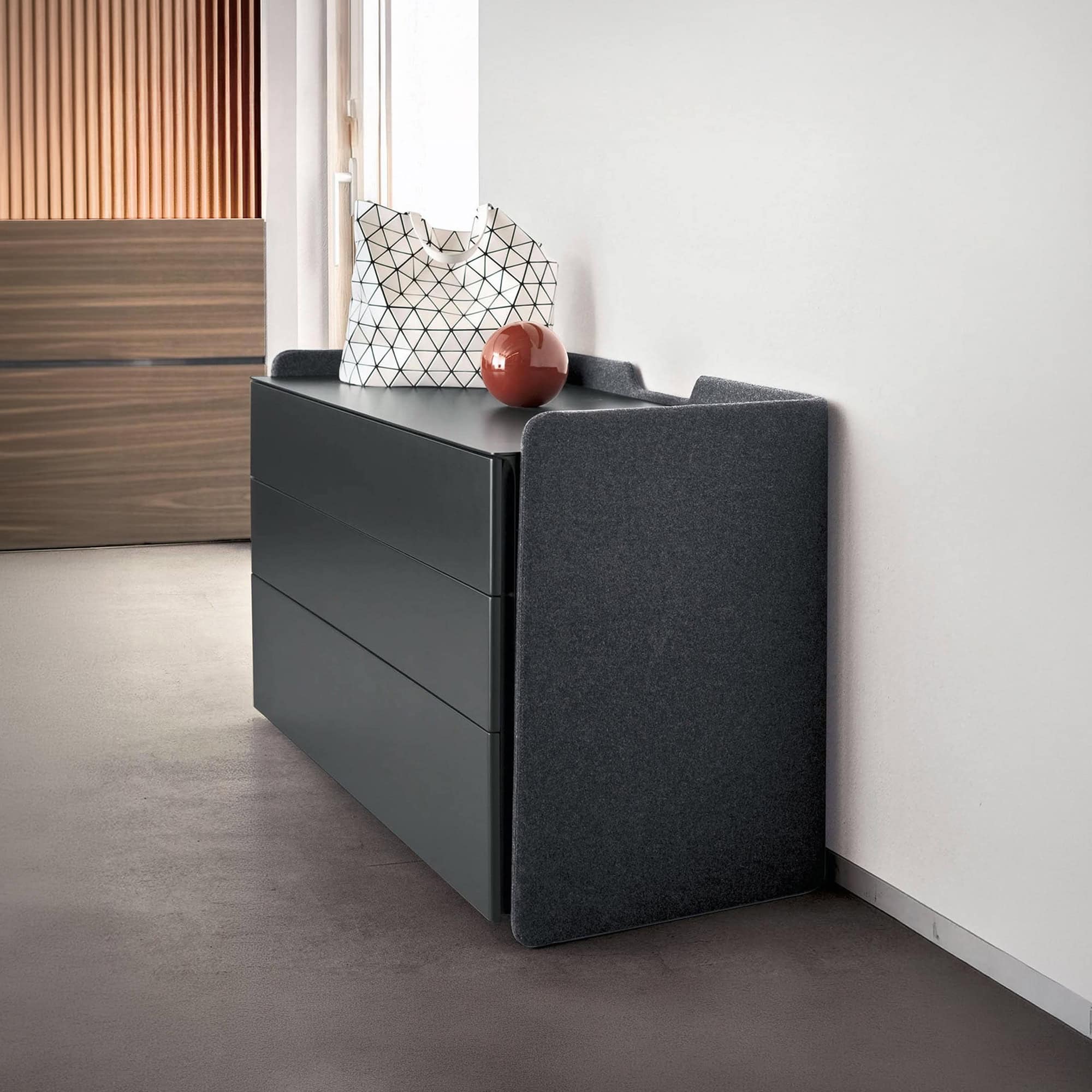 Elegant Chloé upholstered 3-drawer dresser with sleek design and soft fabric finish. Perfect for mod.