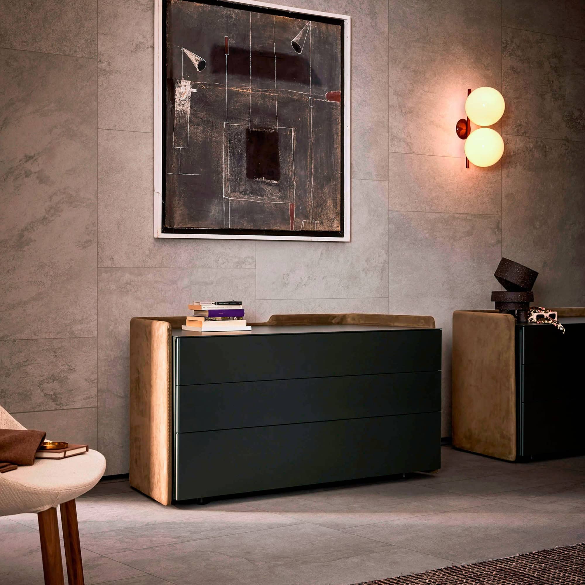 Chloé 3-drawer dresser in matte finish with leather side panels, styled in a modern living space