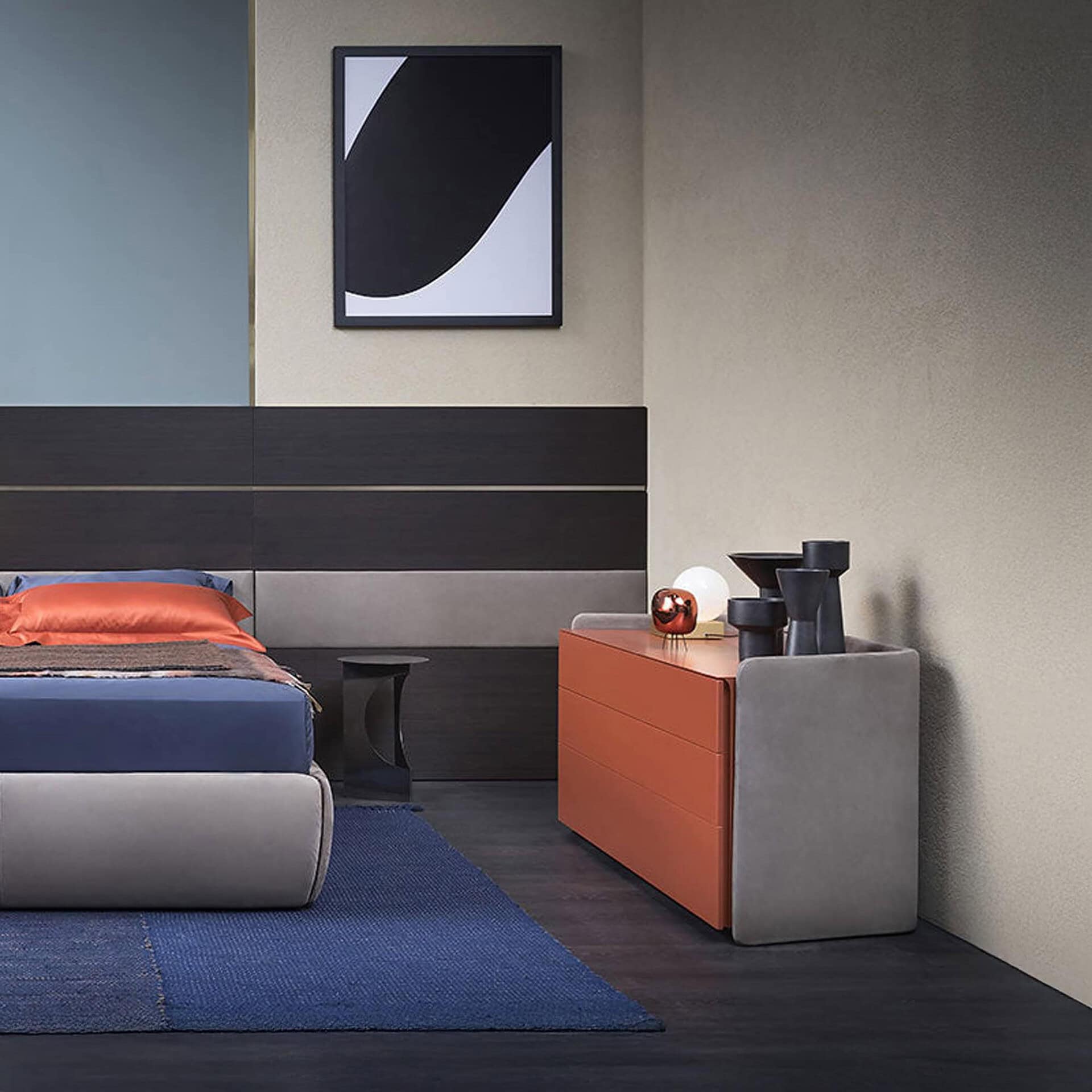 Chloé Upholstered Modern Dresser in bedroom setting with burnt orange accents and modern wall art.