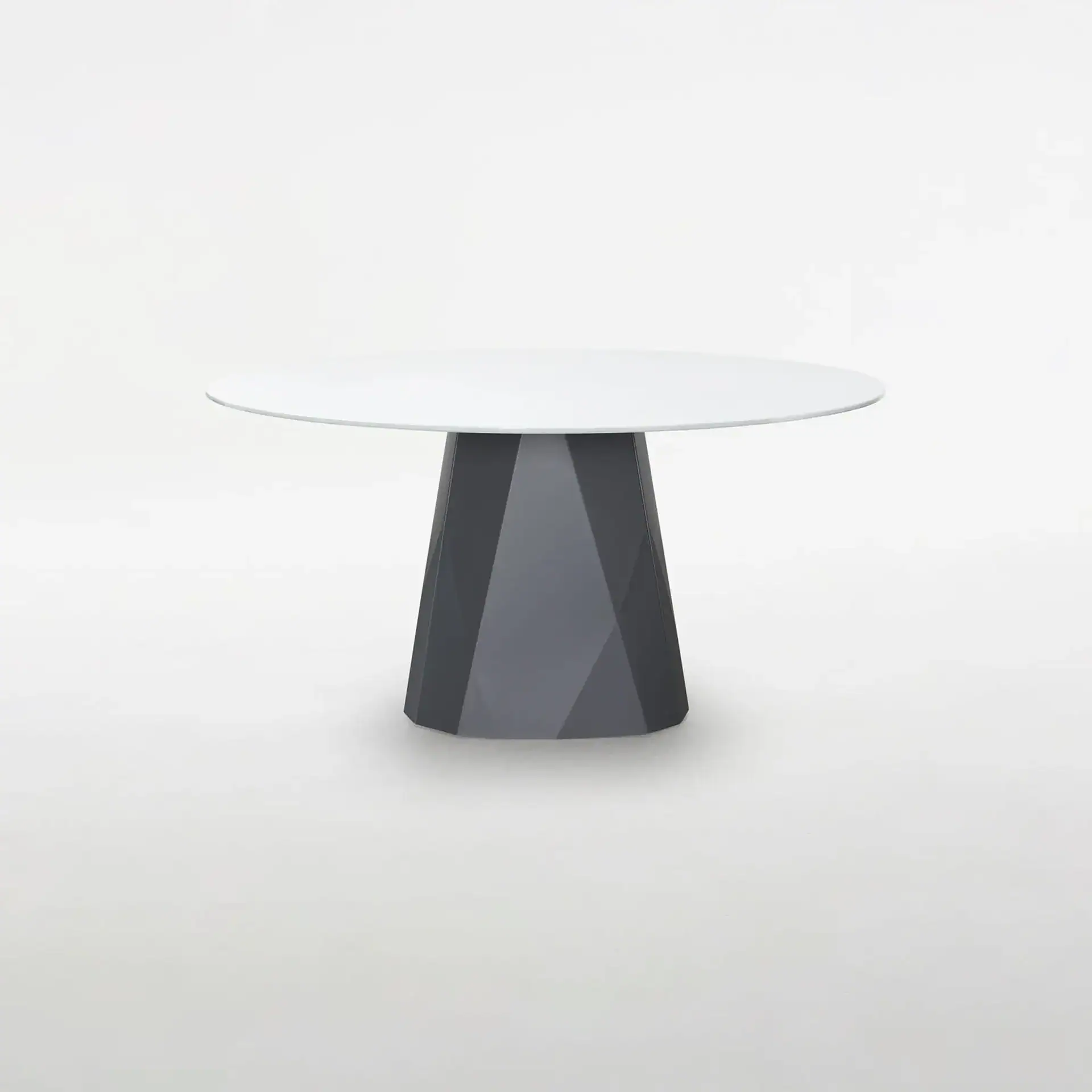Sklar Furnishings Diamond Dining Table with geometric base.