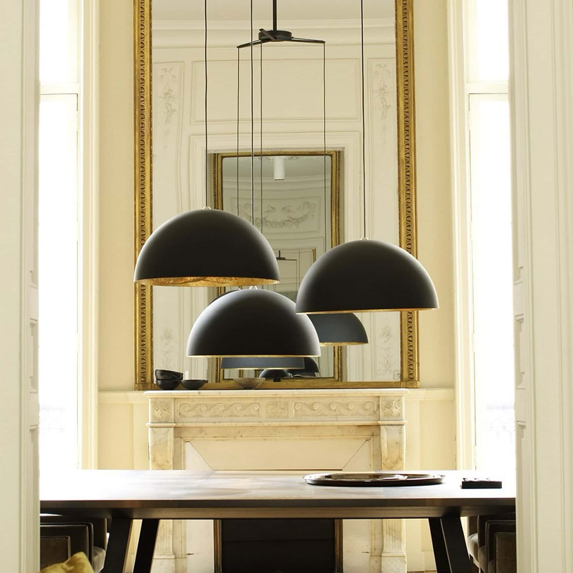 Modern Stchu-Moon chandelier with black dome shades, ideal for contemporary interiors.