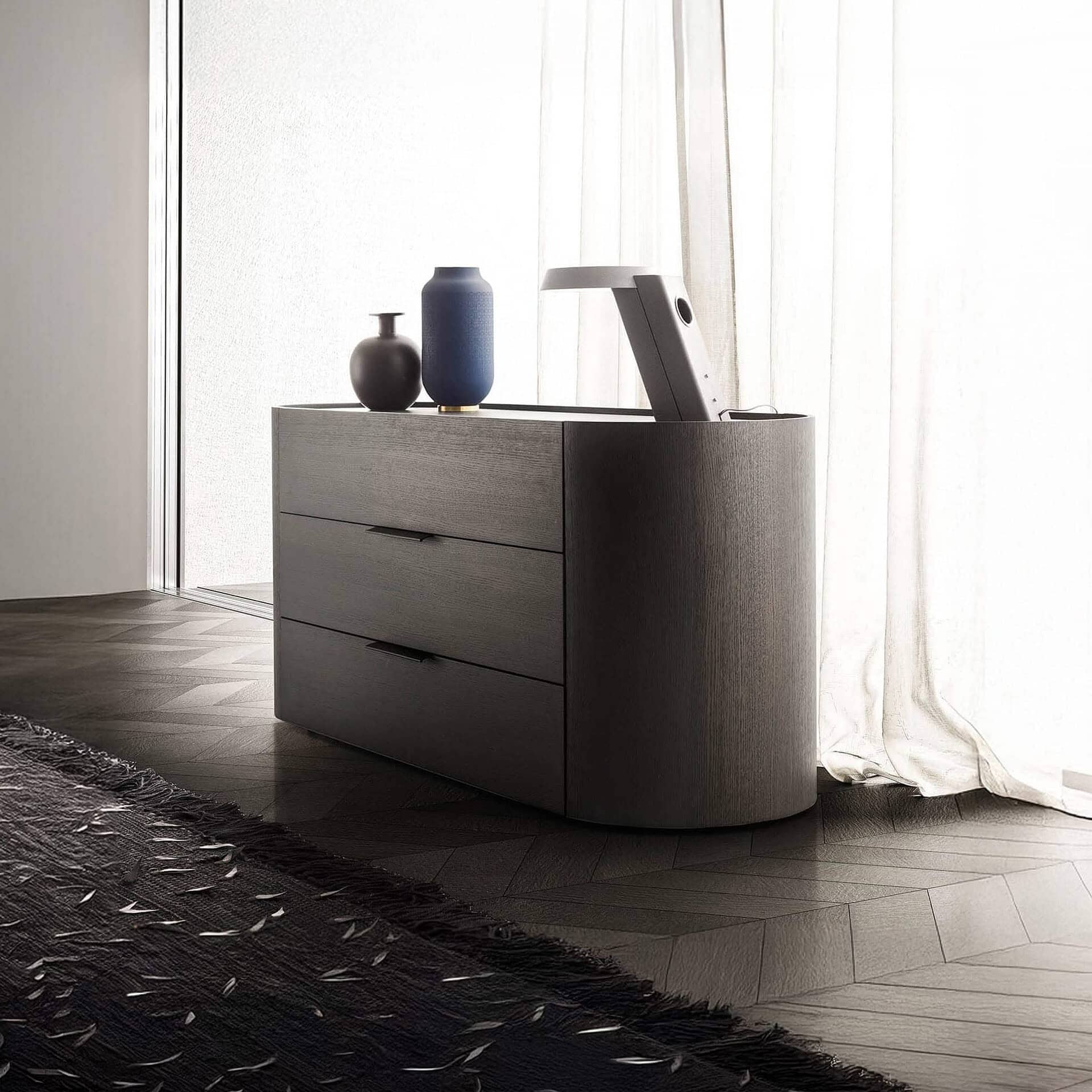 Modern Dedalo 3-drawer dresser in a contemporary bedroom setting.