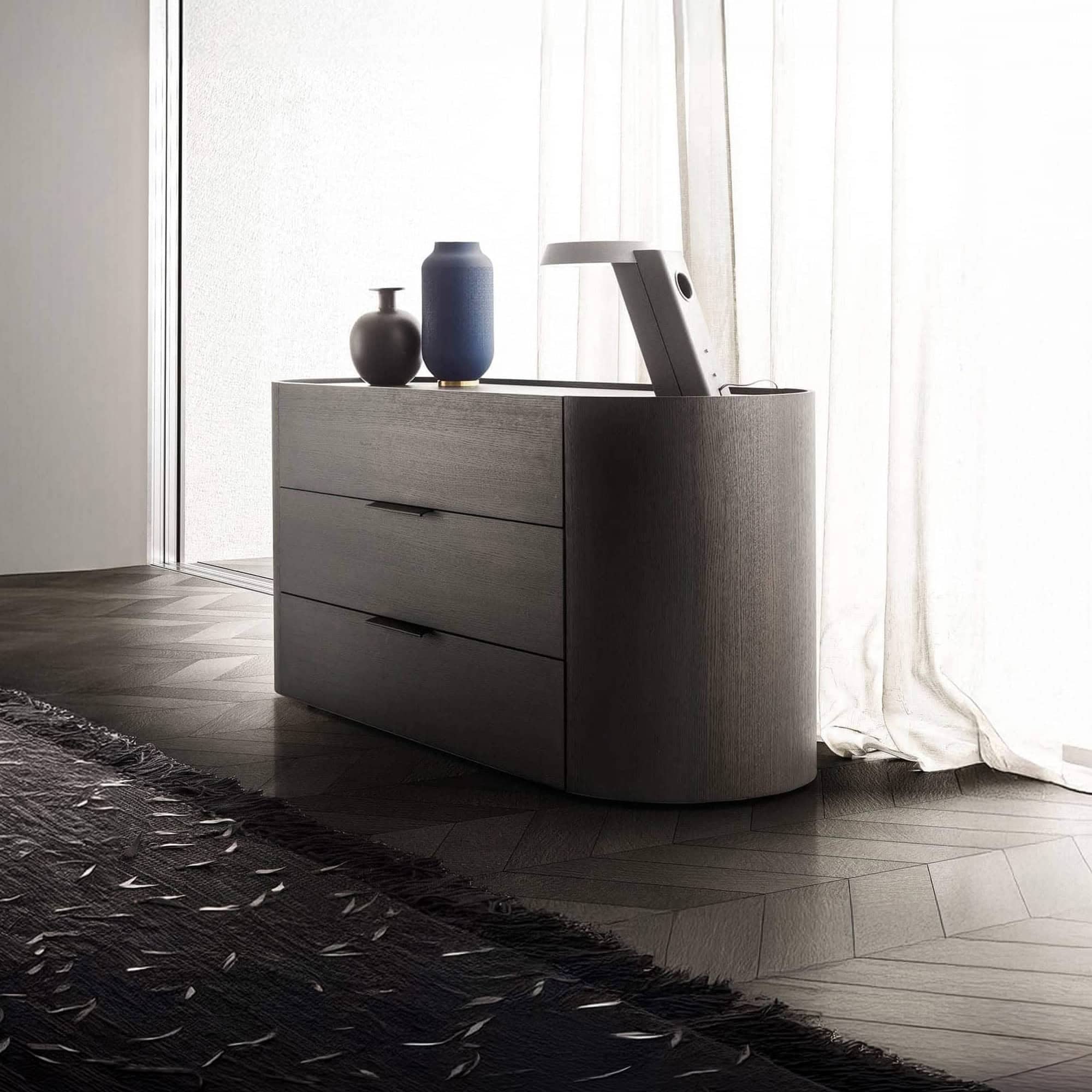 Modern Dedalo 3-drawer dresser in a contemporary bedroom setting.