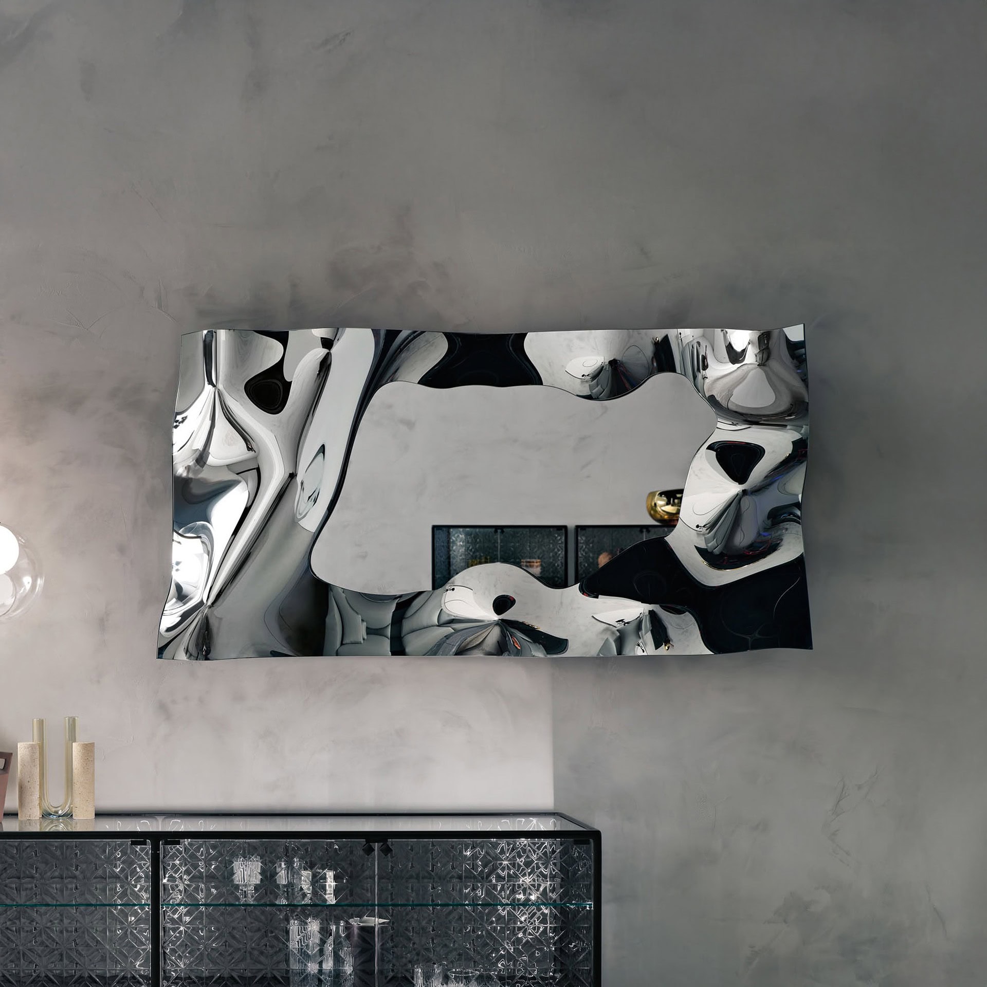 Christine Mirror in rectangular format displayed on a concrete wall in a modern industrial space.