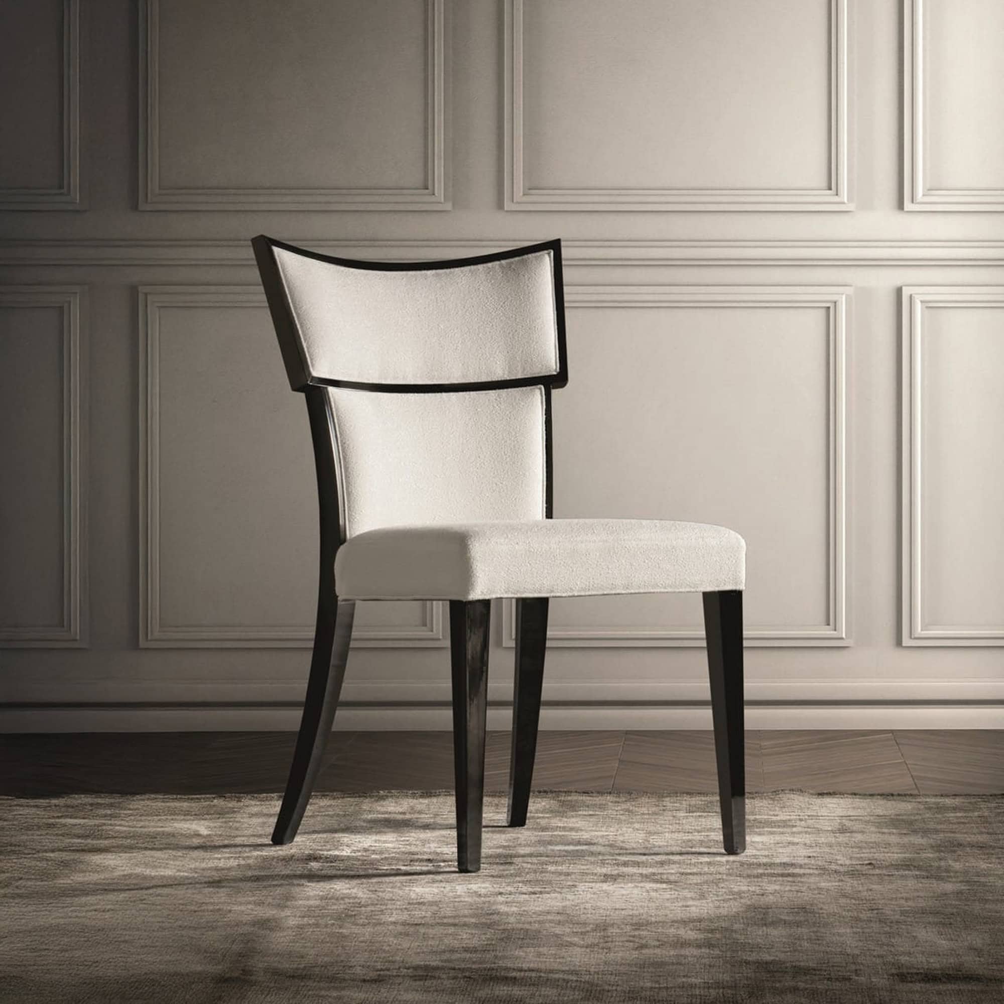 Luxury dining chair with cream fabric and dark wooden frame, perfect for sophisticated interiors.