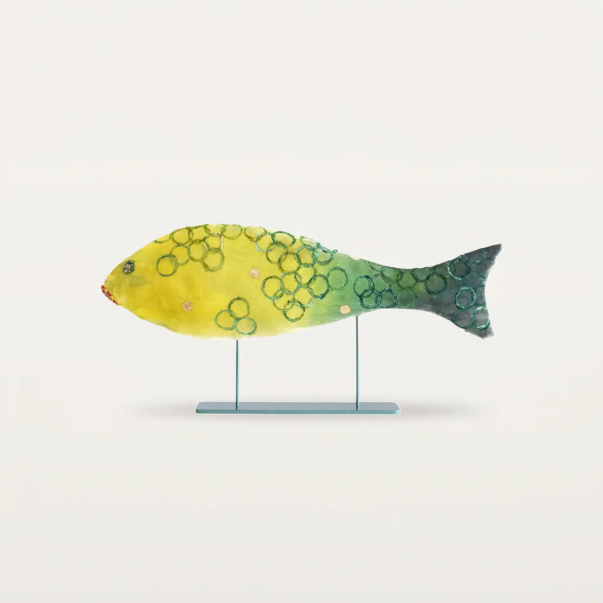 Vibrant fish art piece with green and yellow hues, perfect for modern living spaces.