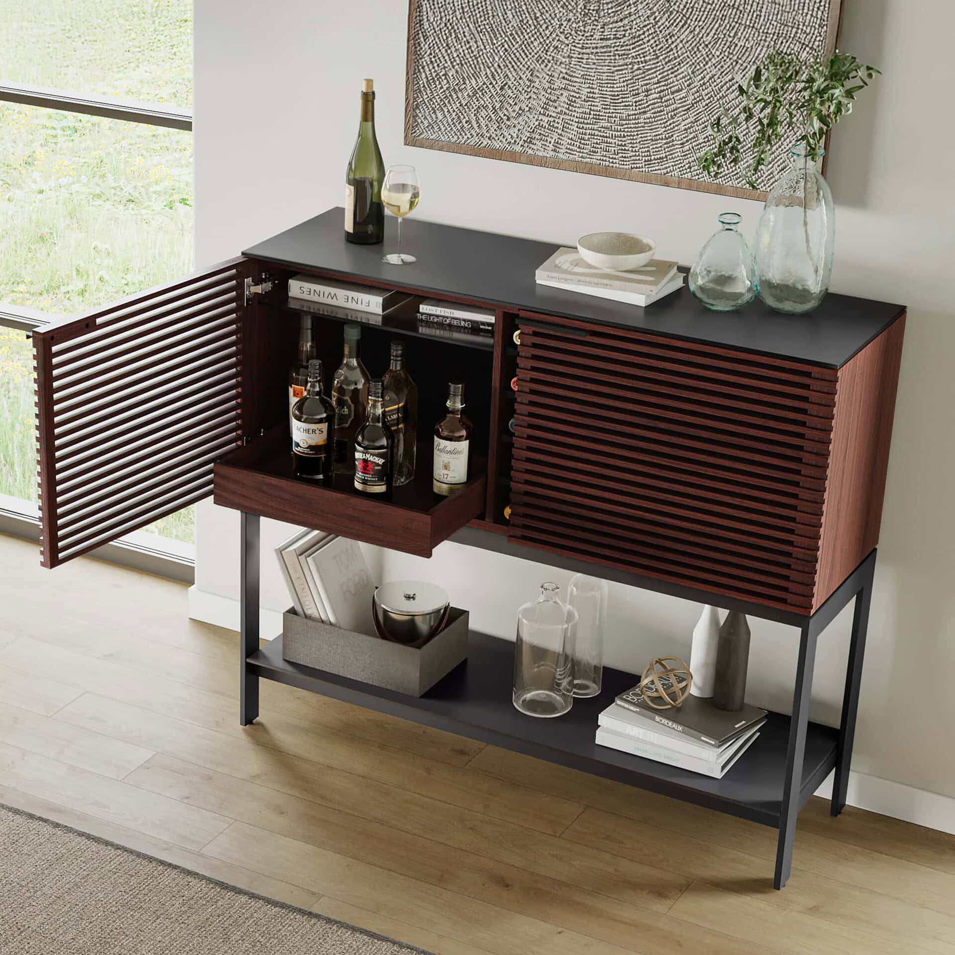 Modern wooden sideboard with wine storage and black tabletop, stylish home bar furniture.