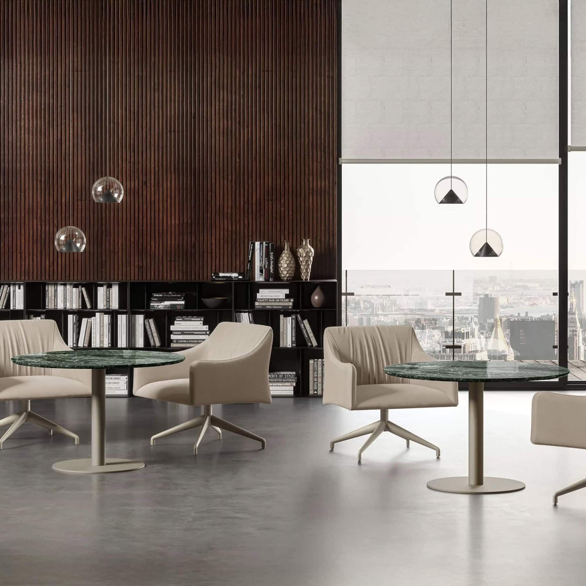 Cilindro Bistro Tables in a large modern dining room with minimalist décor.