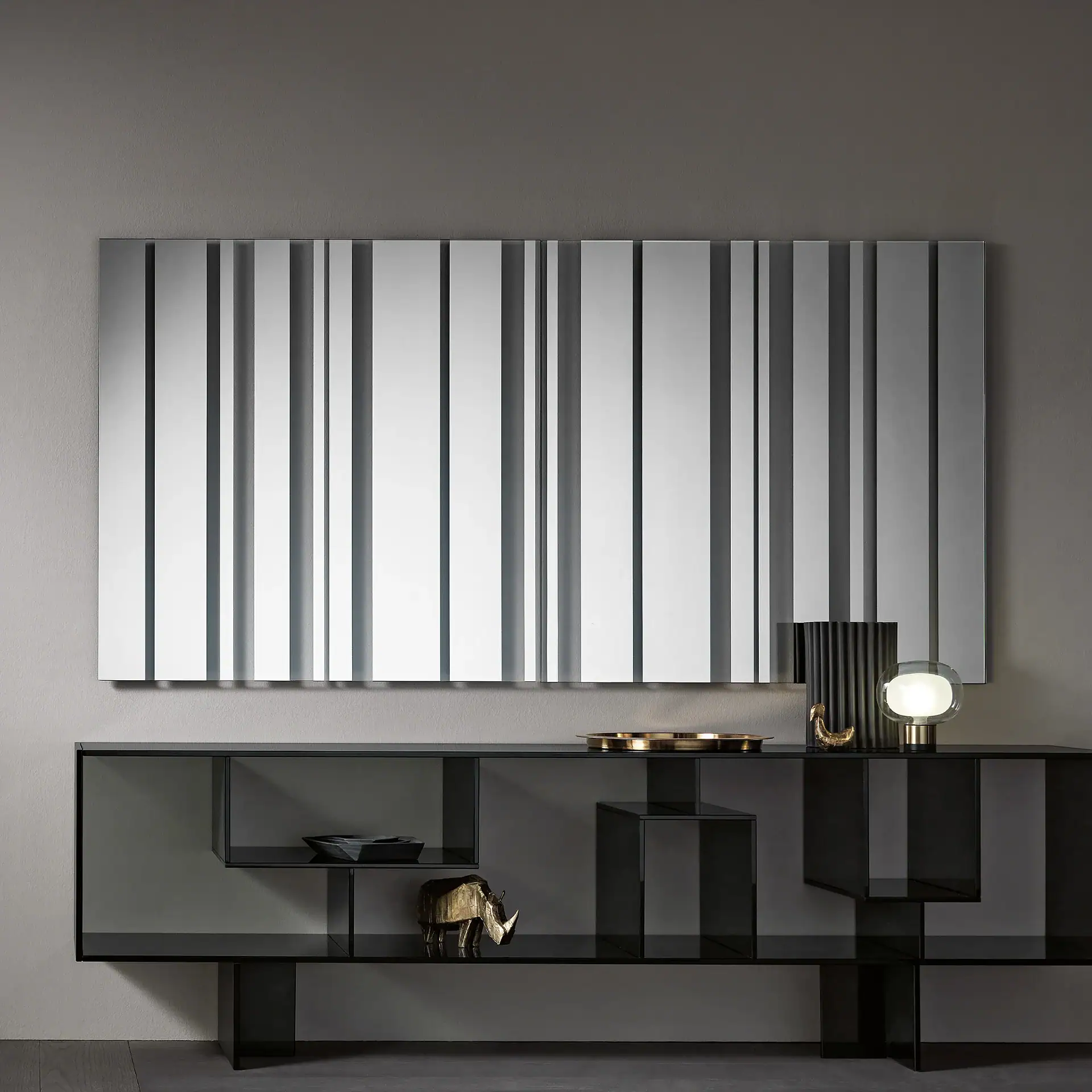 Barcode wall mirror with vertical black and white stripes in modern interior.