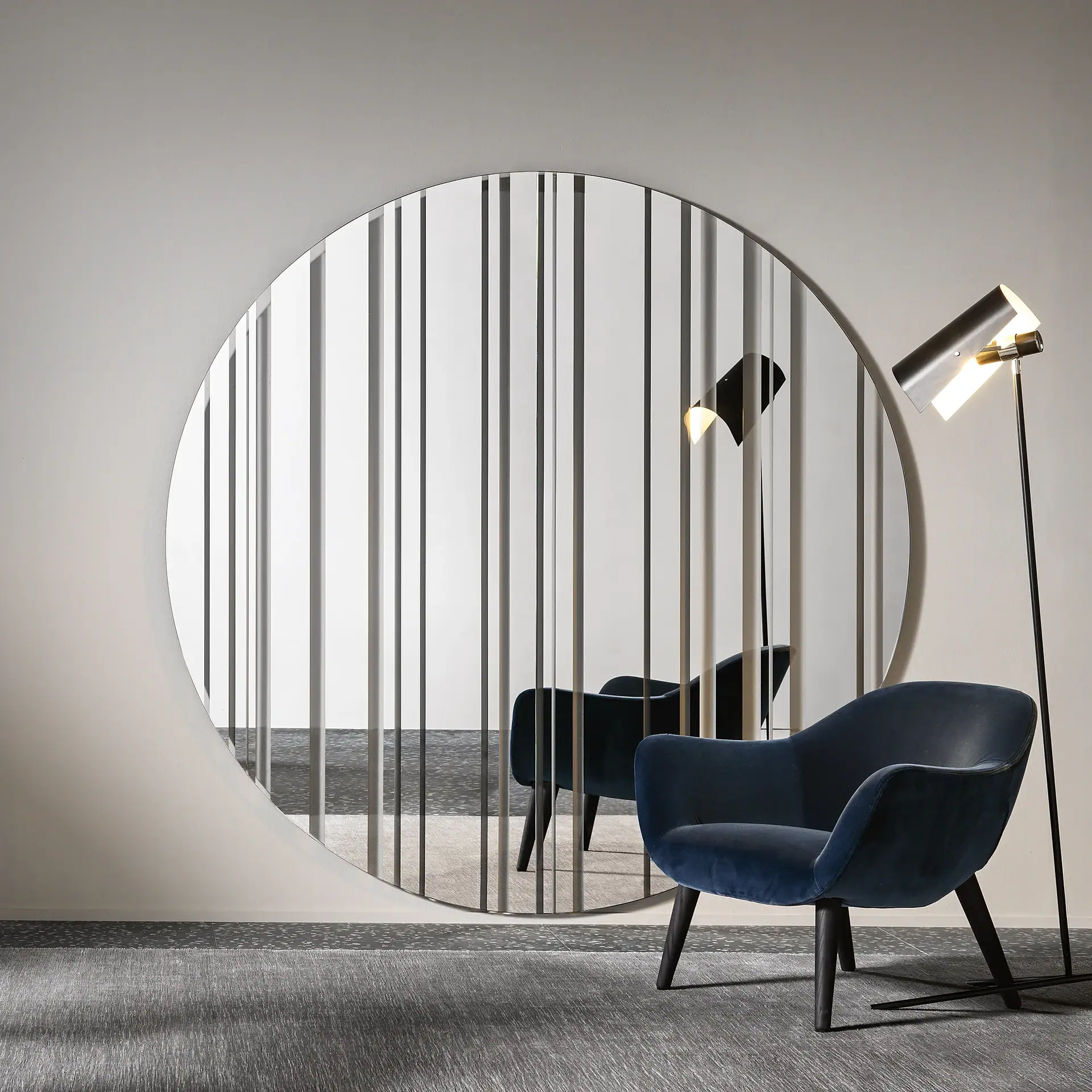 Barcode wall mirror with black metal bars and round shape in modern interior.