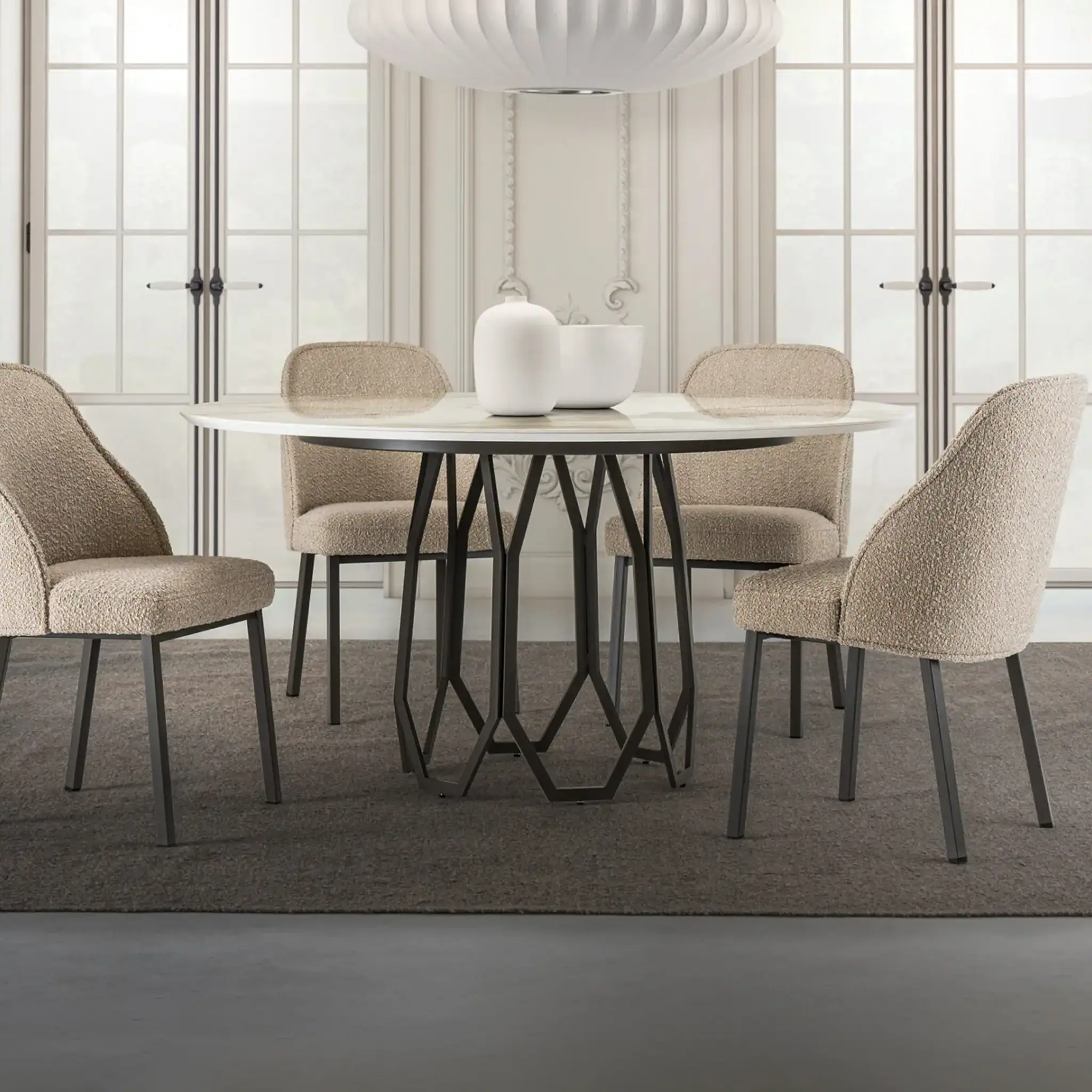 Contemporary dining table with beige upholstered chairs in a stylish, well-lit room.