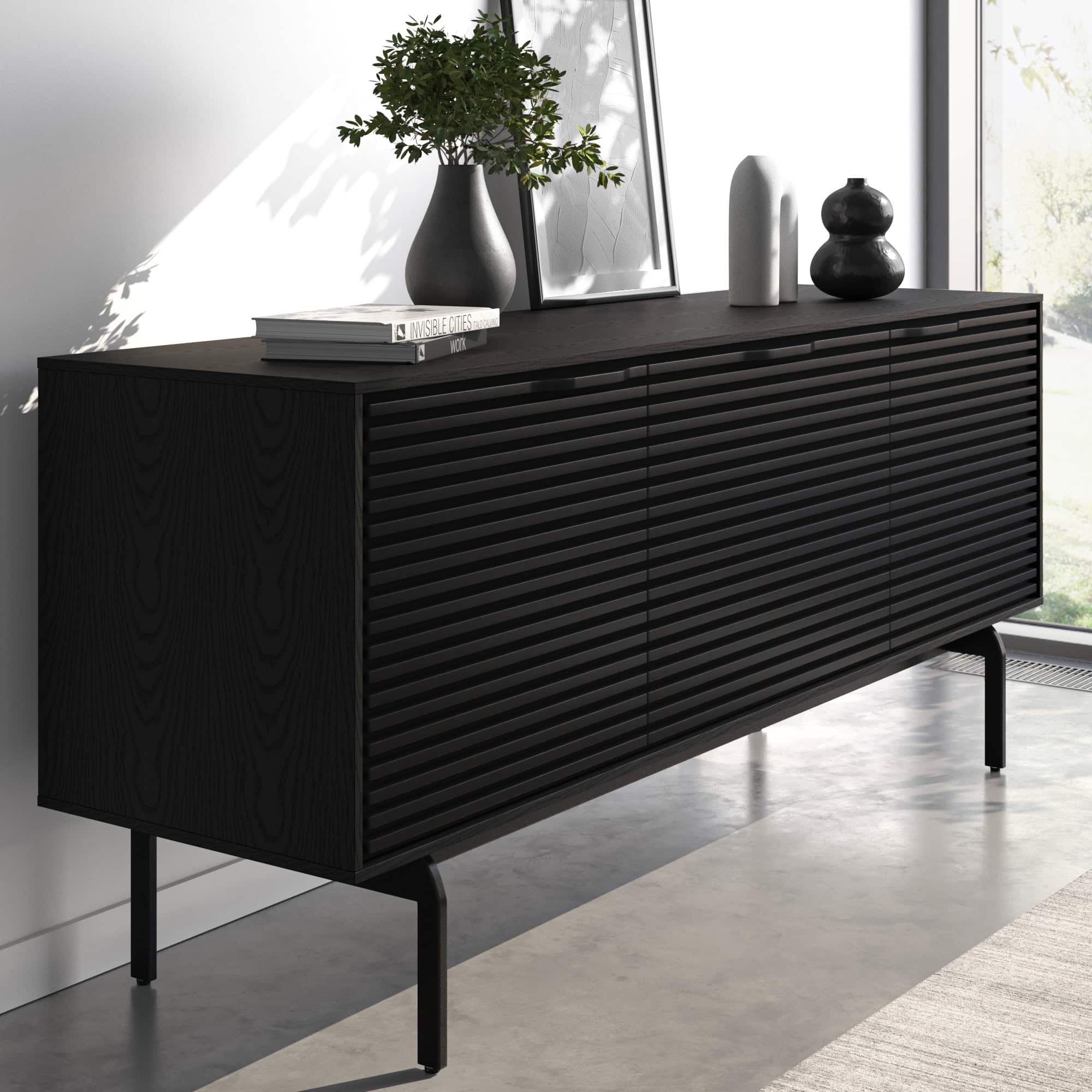 Angled view of black Align 7477 console highlighting louvered door design.