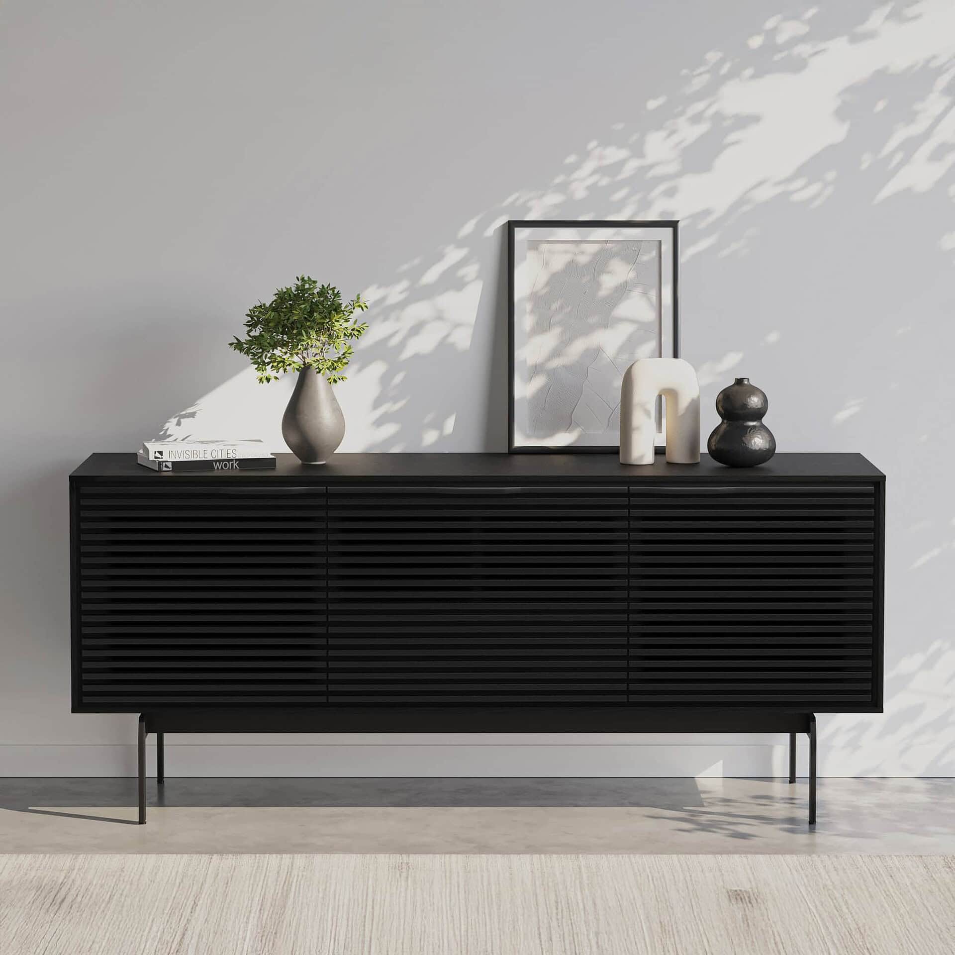 Black Align 7477 console in a contemporary living room with decor accents.