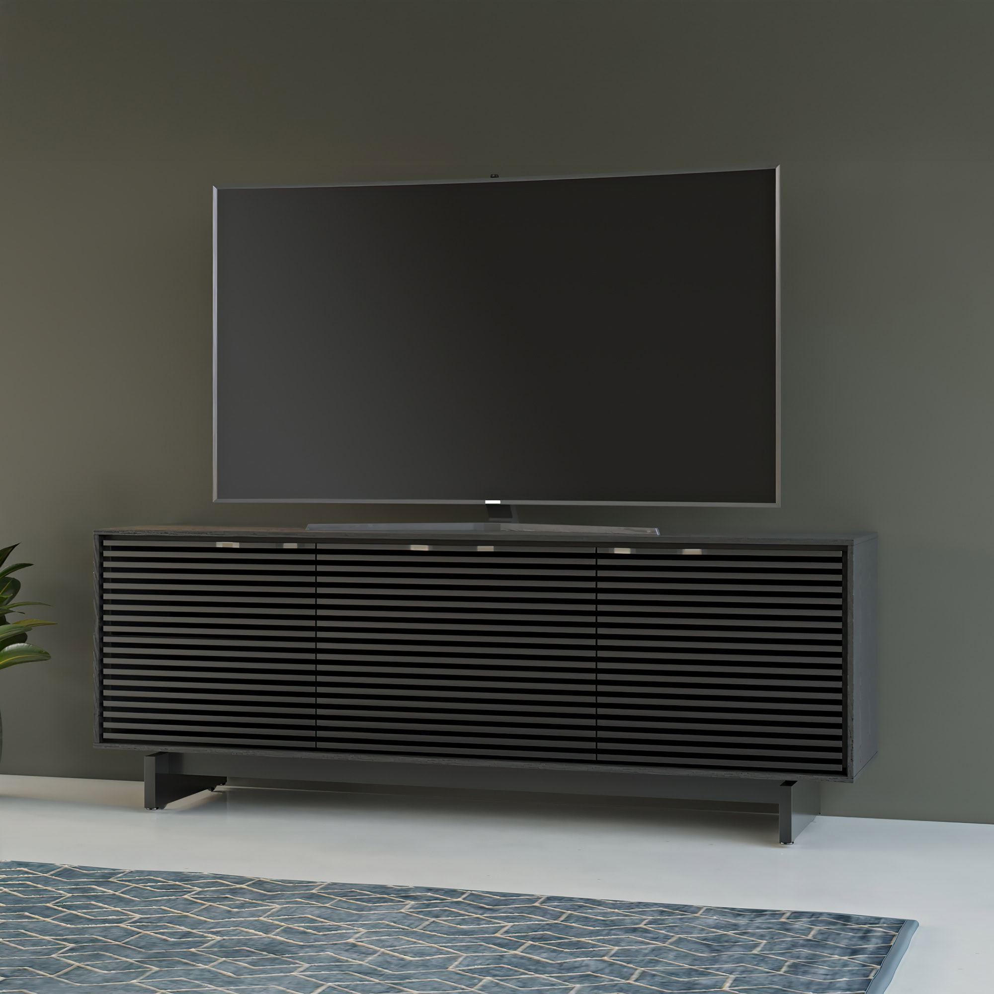 Black Align 7477 console supporting a large flat-screen TV.