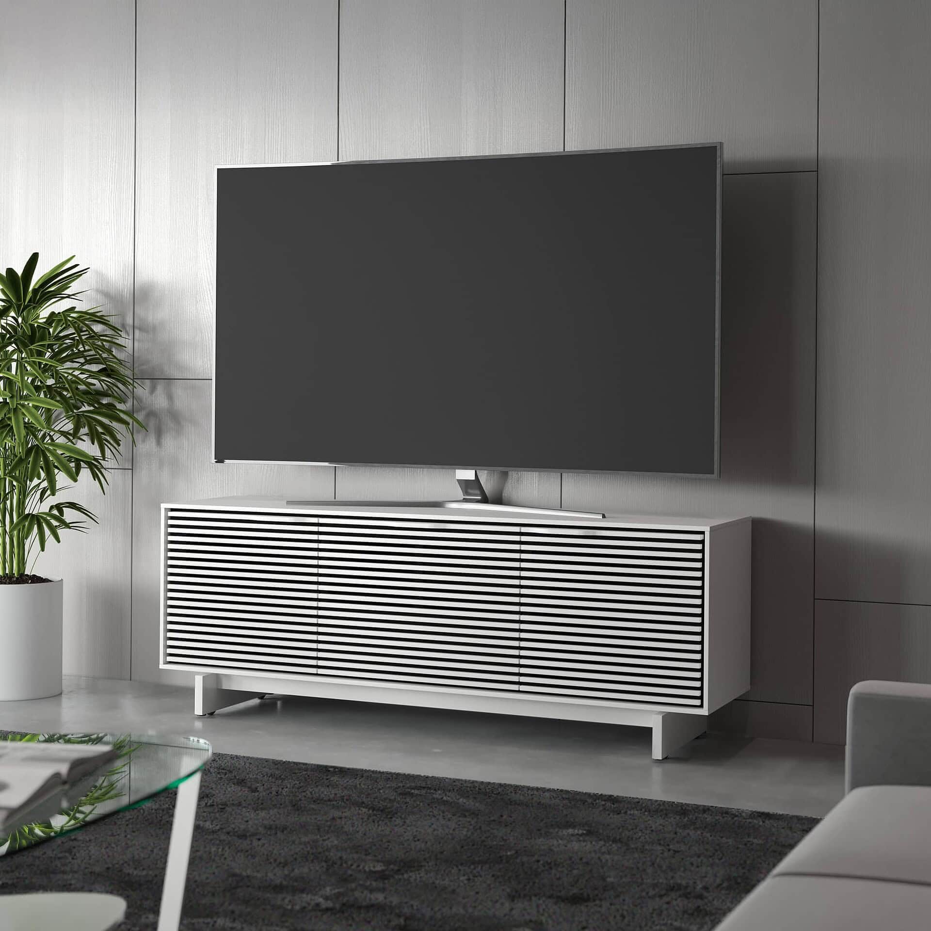 White Align 7477 console used as a TV stand in a modern living room.