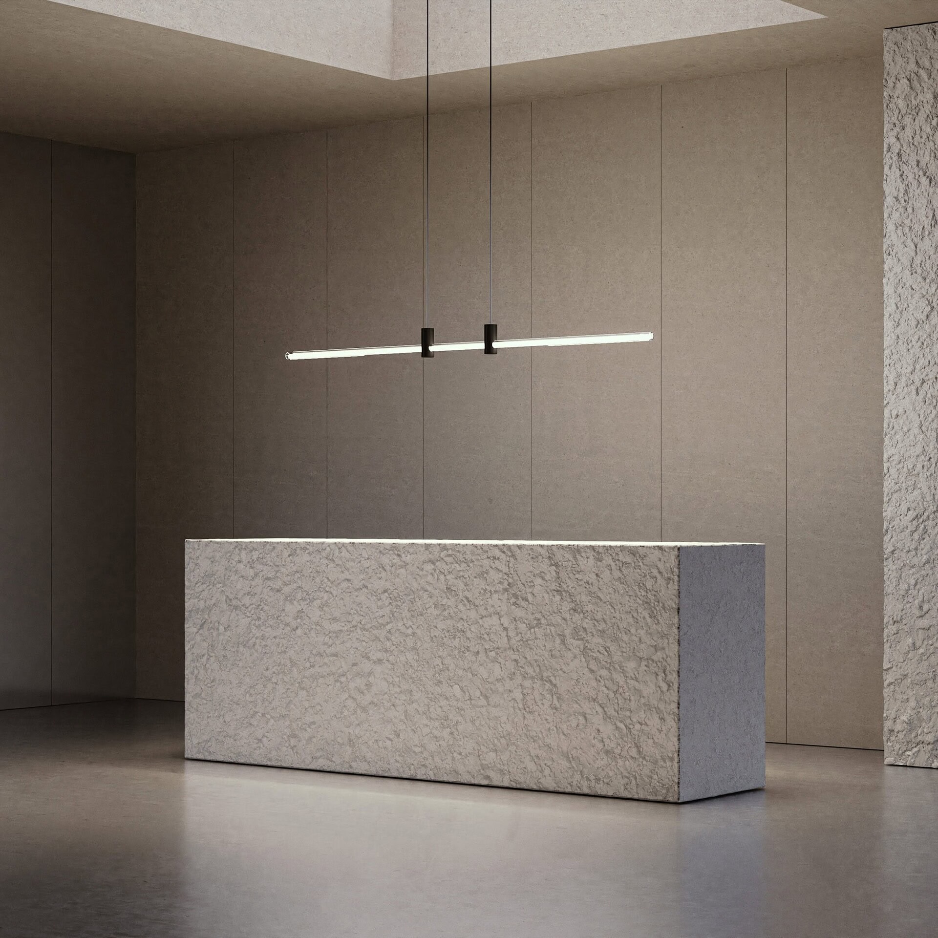 Bright modern minimalist reception desk with textured concrete finish.