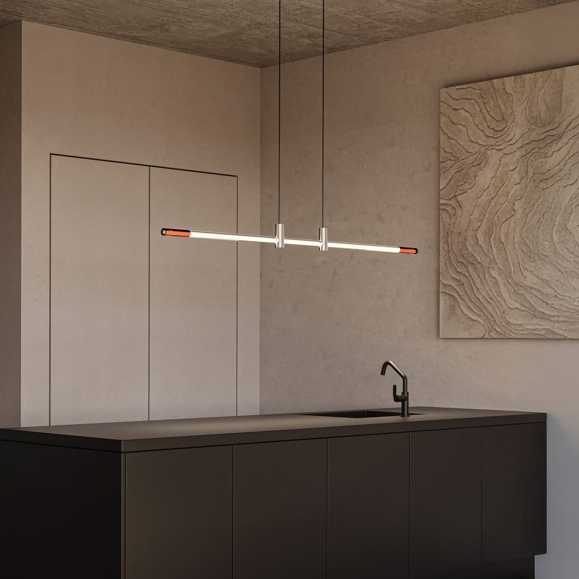 Minimalist modern pendant lighting over sleek black kitchen island for contemporary home decor.