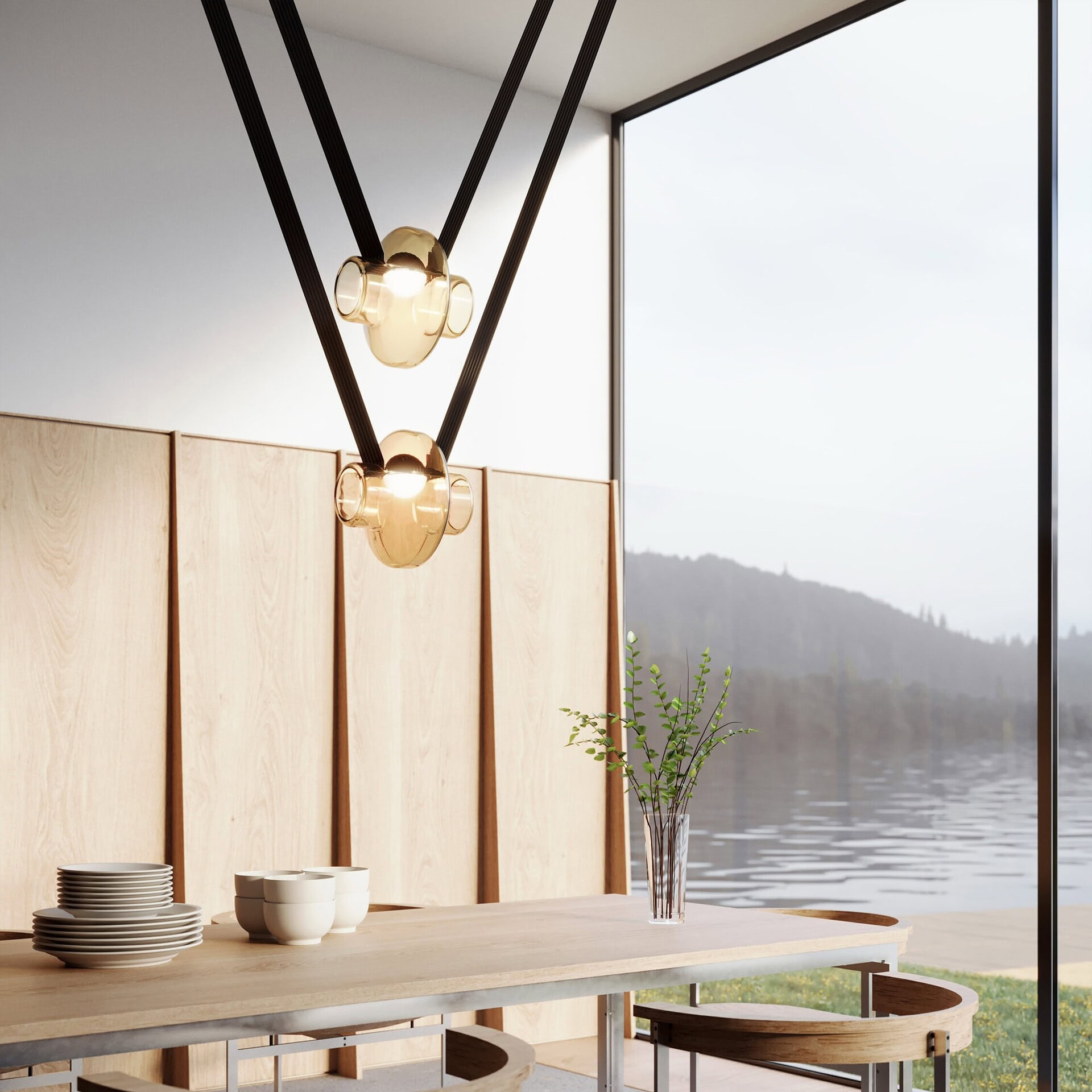 Elegant modern dining room with minimalistic decor and statement pendant lighting at Sklar Furnishings.