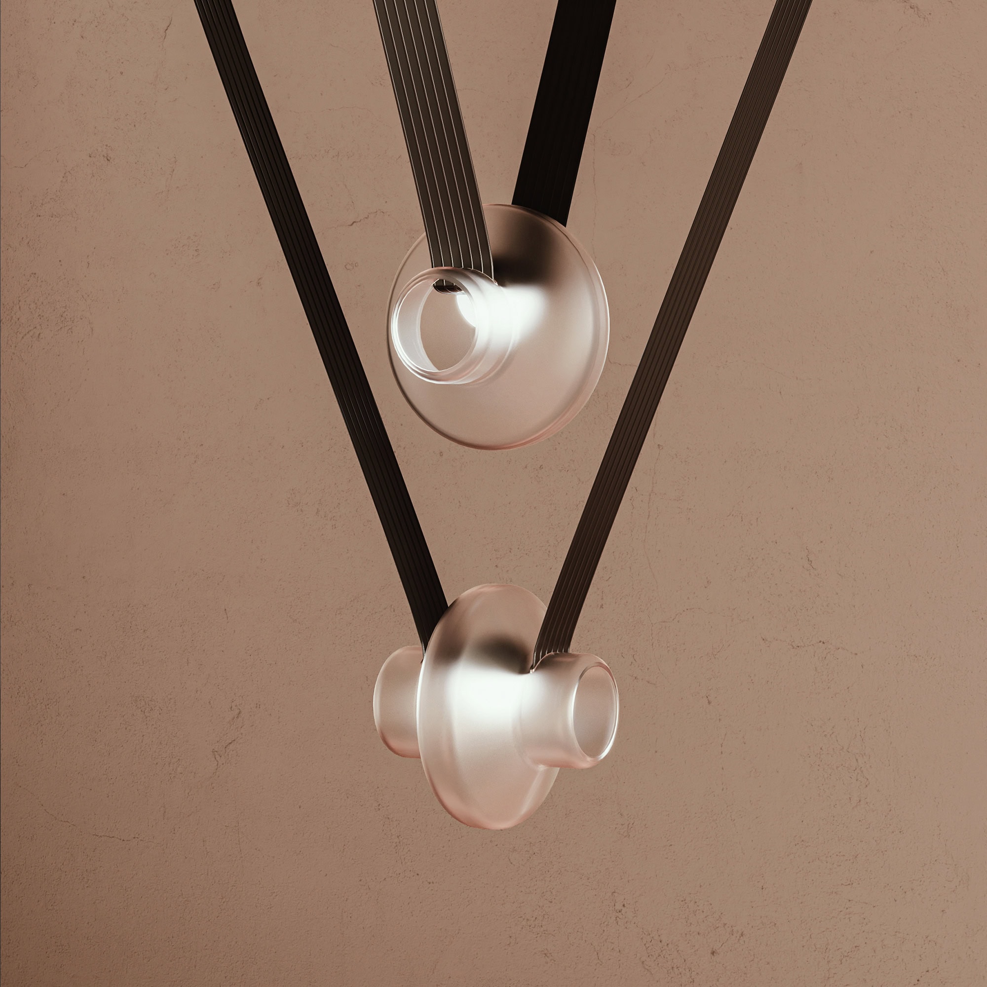 Modern sculptural pendant lighting fixture with glass and metal elements.