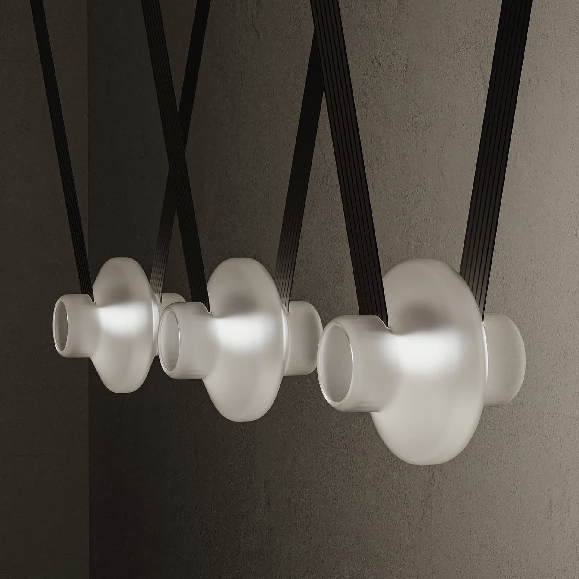 Sleek modern pendant light fixture with black and white design, ideal for contemporary home interiors.