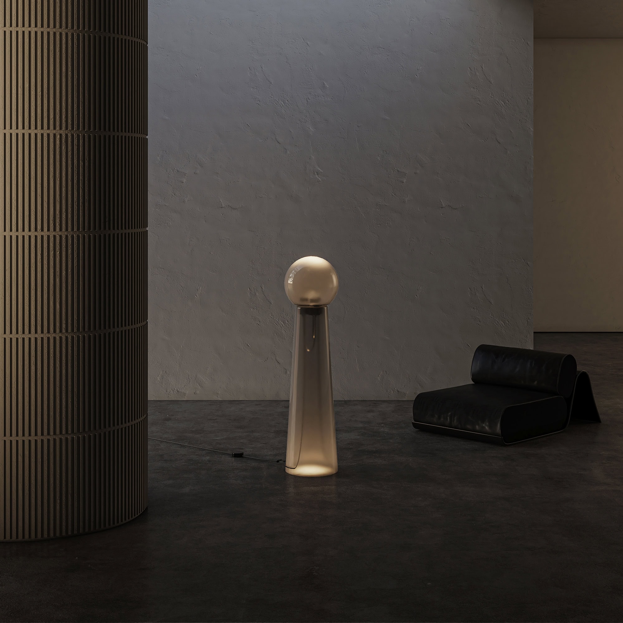 Contemporary room decor with sleek black lounge chair and modern lighting fixture.