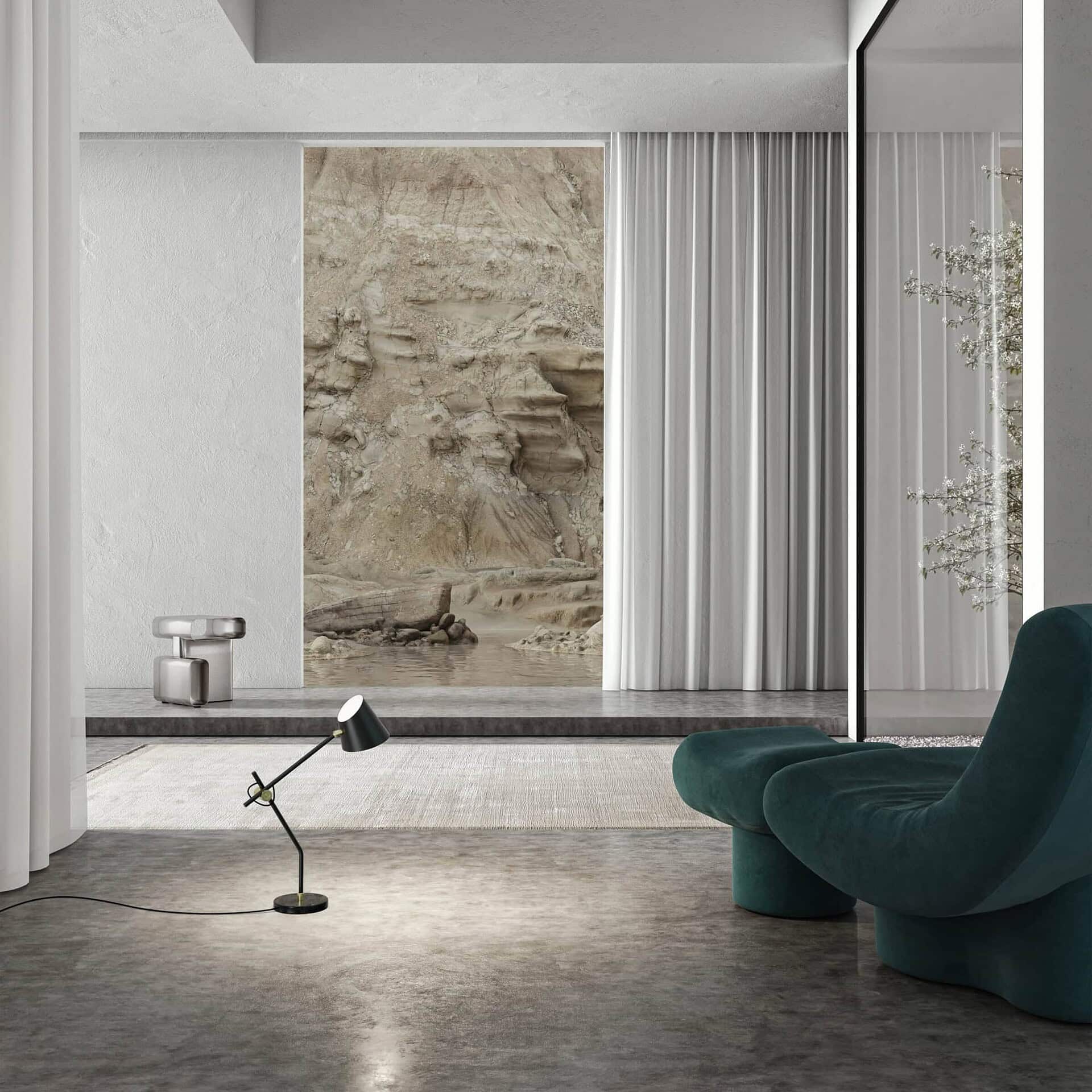 Modern living room with minimalist decor, neutral tones, and large window views of natural landscape.