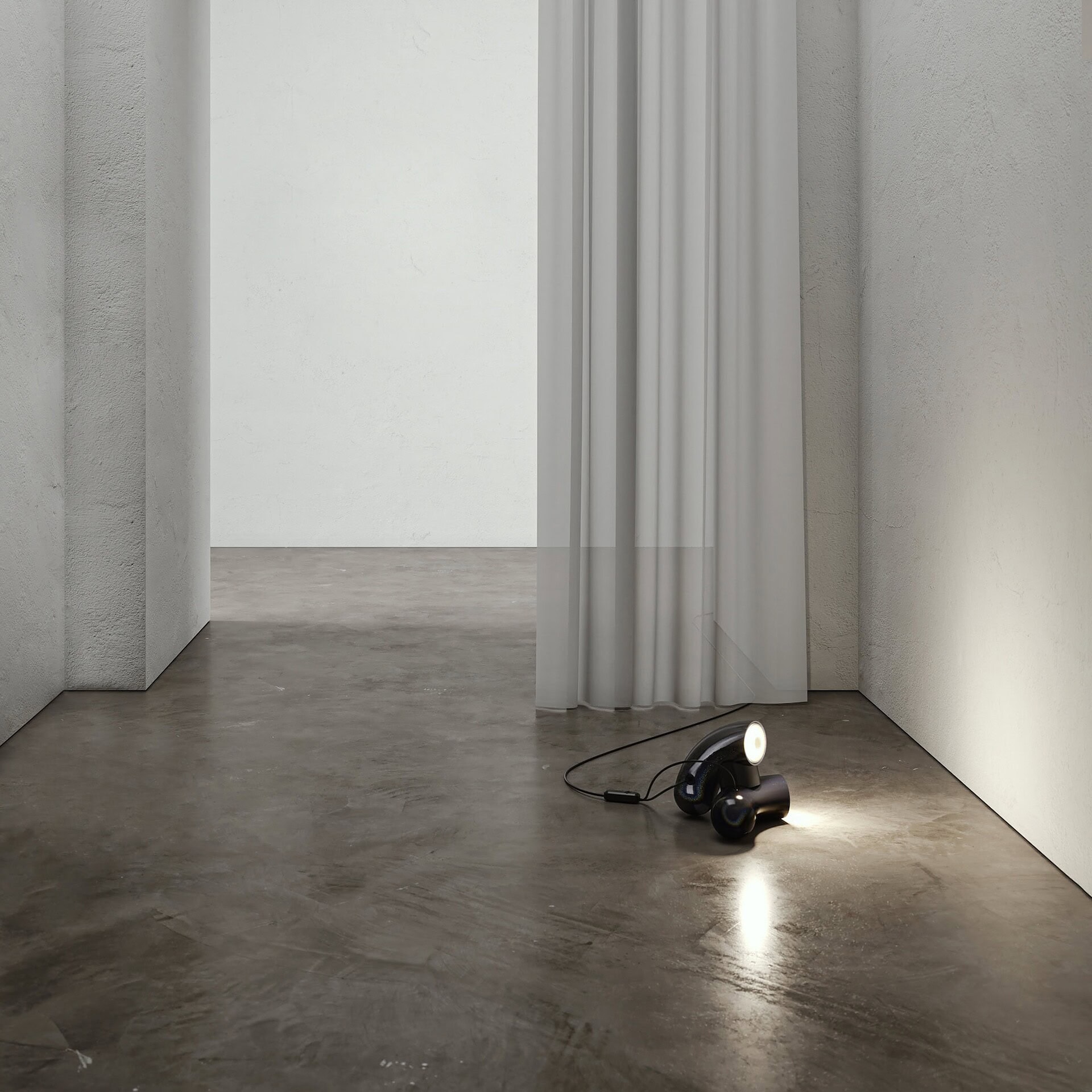 Modern black cordless lamp on concrete floor with white curtains, minimalist interior decor.