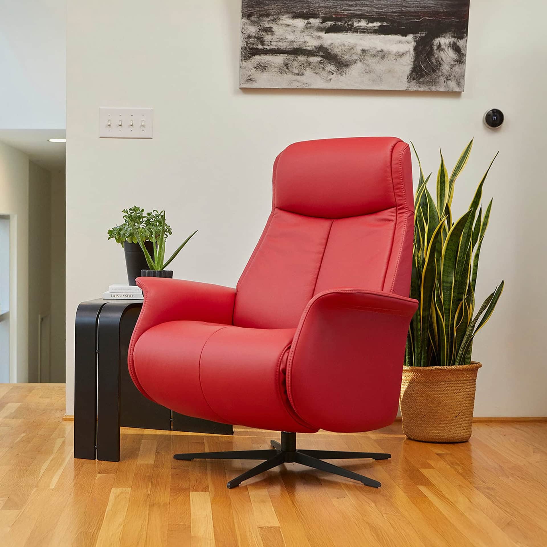 Red office chair with ergonomic design and adjustable height.