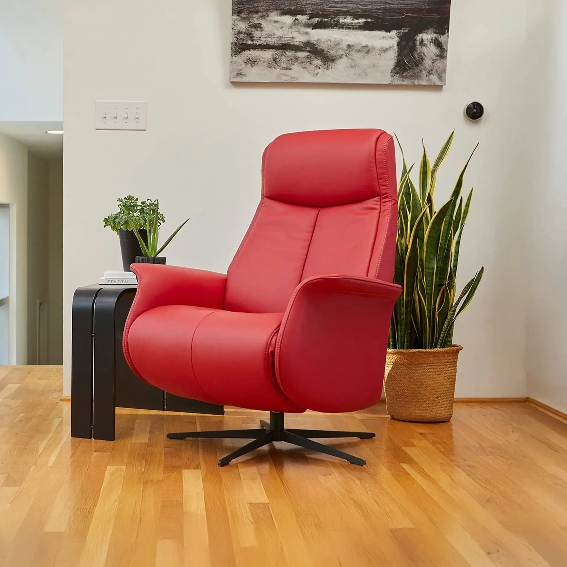 Red office chair with ergonomic design and adjustable height.