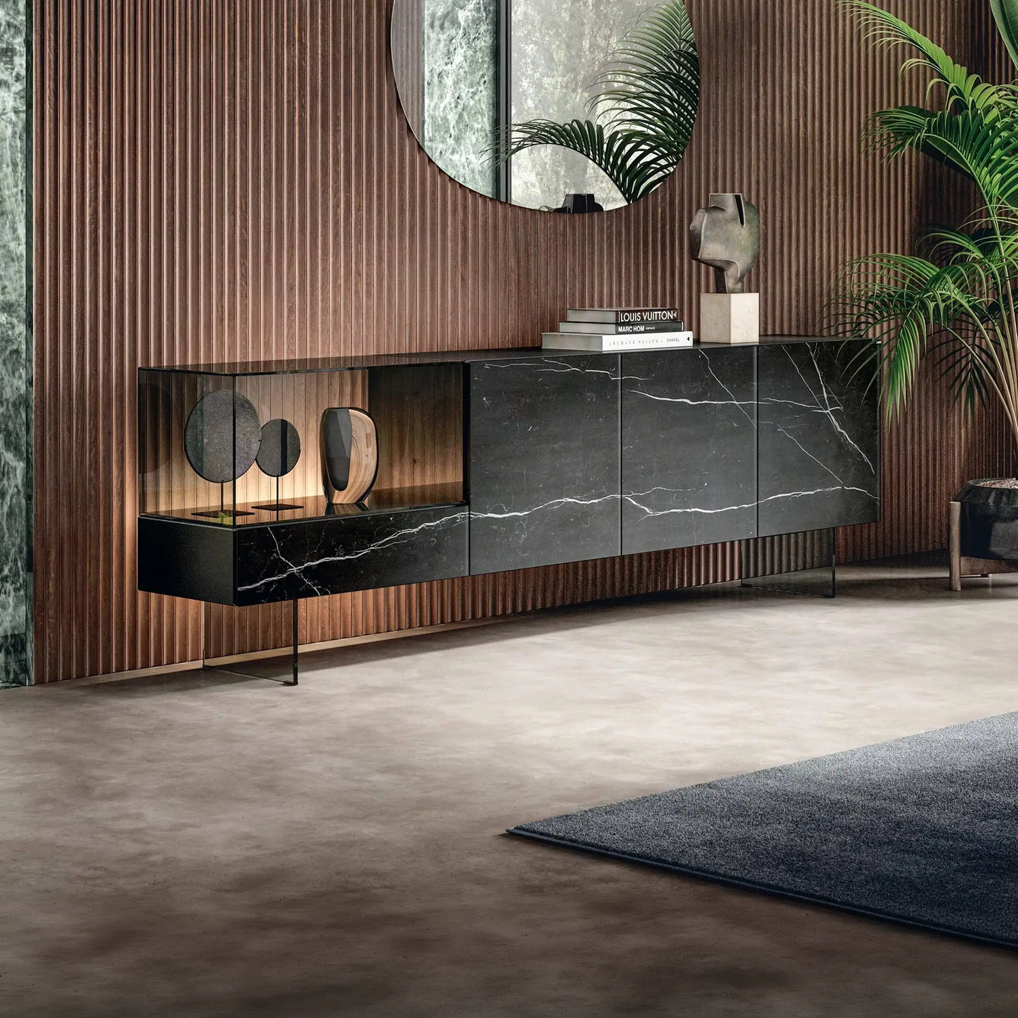 Sklar Furnishings glass sideboard with black marble finish and decorative objects.