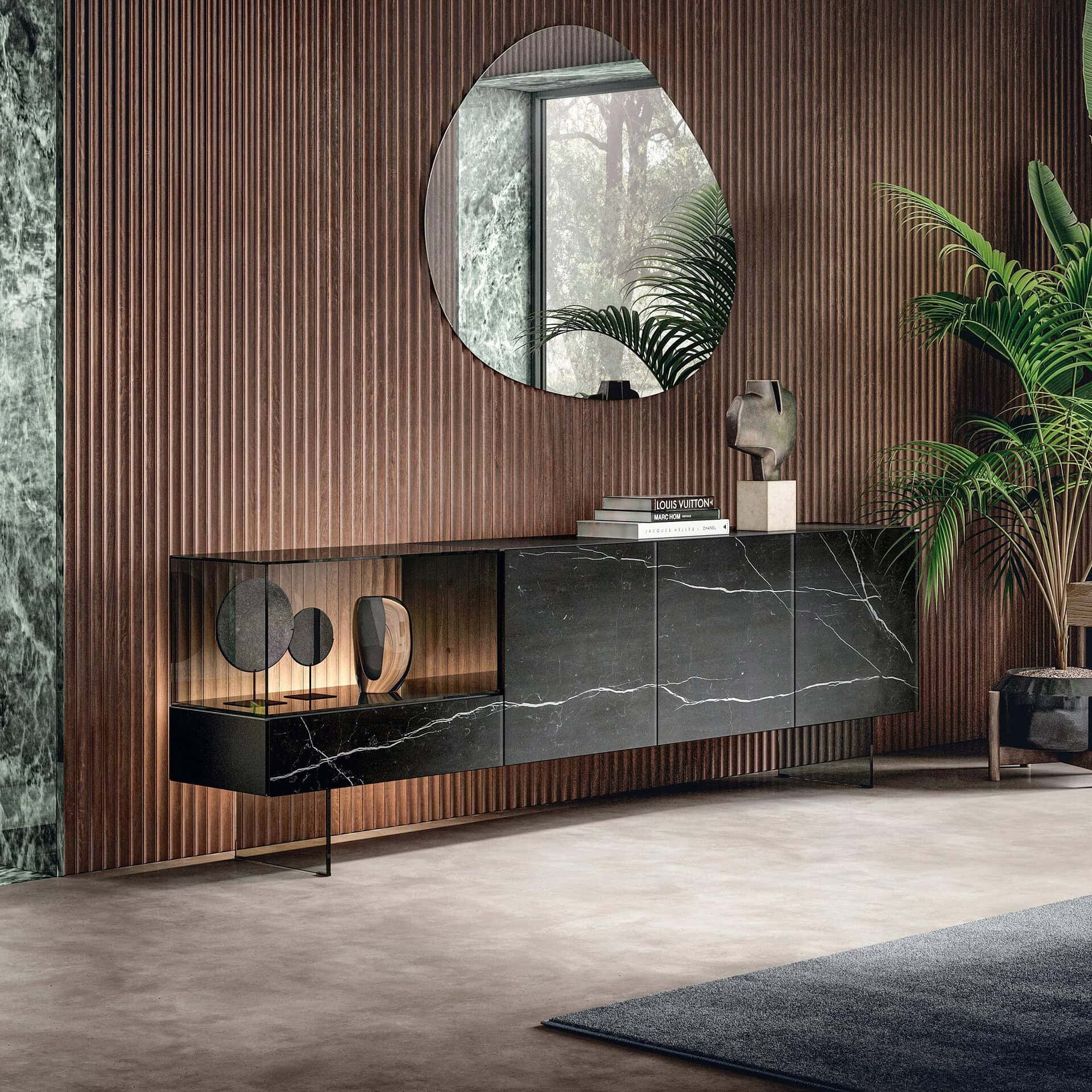Modern black marble sideboard with glass doors in stylish living room.