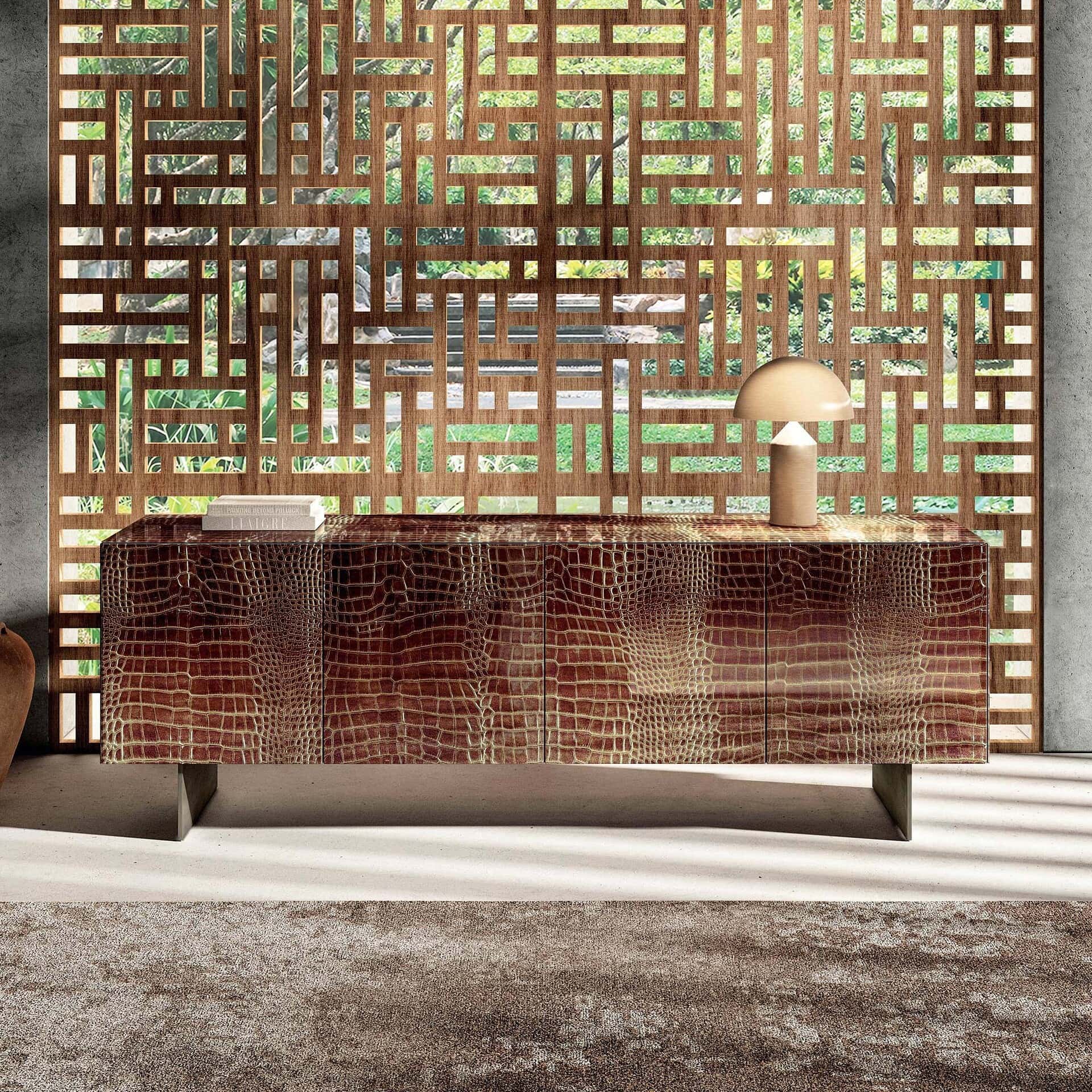 Modern wooden sideboard with geometric wall decor in a stylish interior setting.