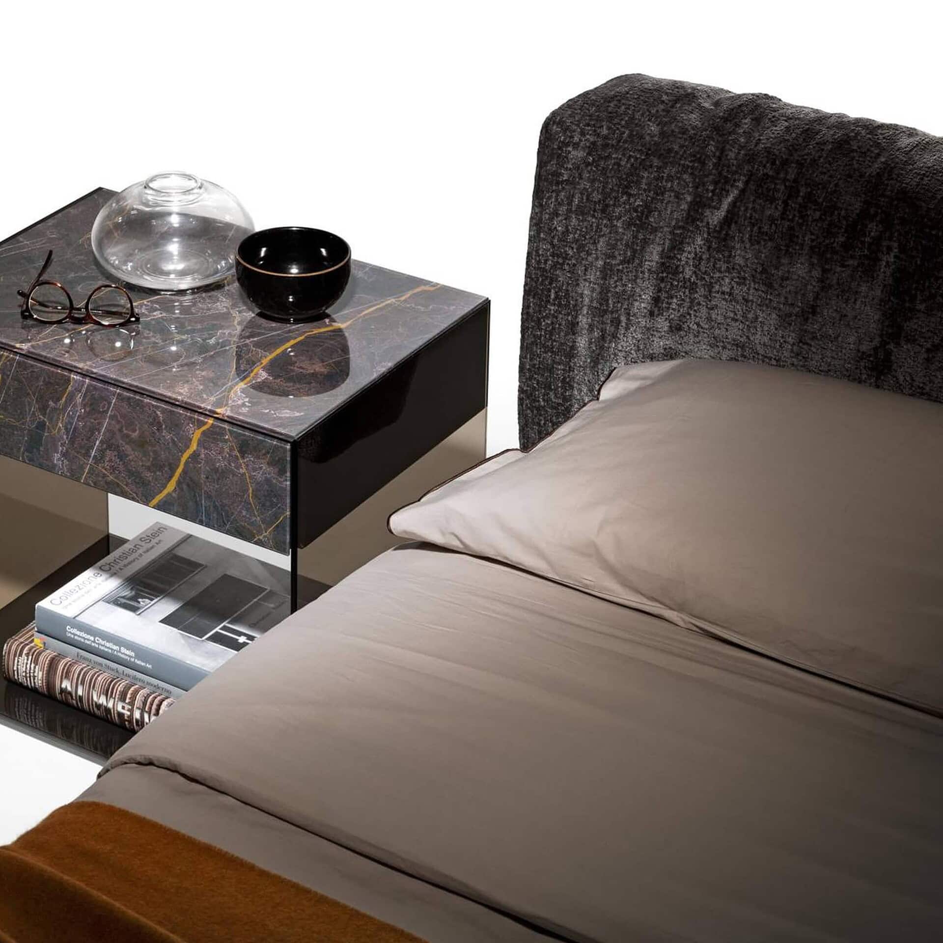 Detail of Steel Soft Upholstered Bed with nightstand and bedding