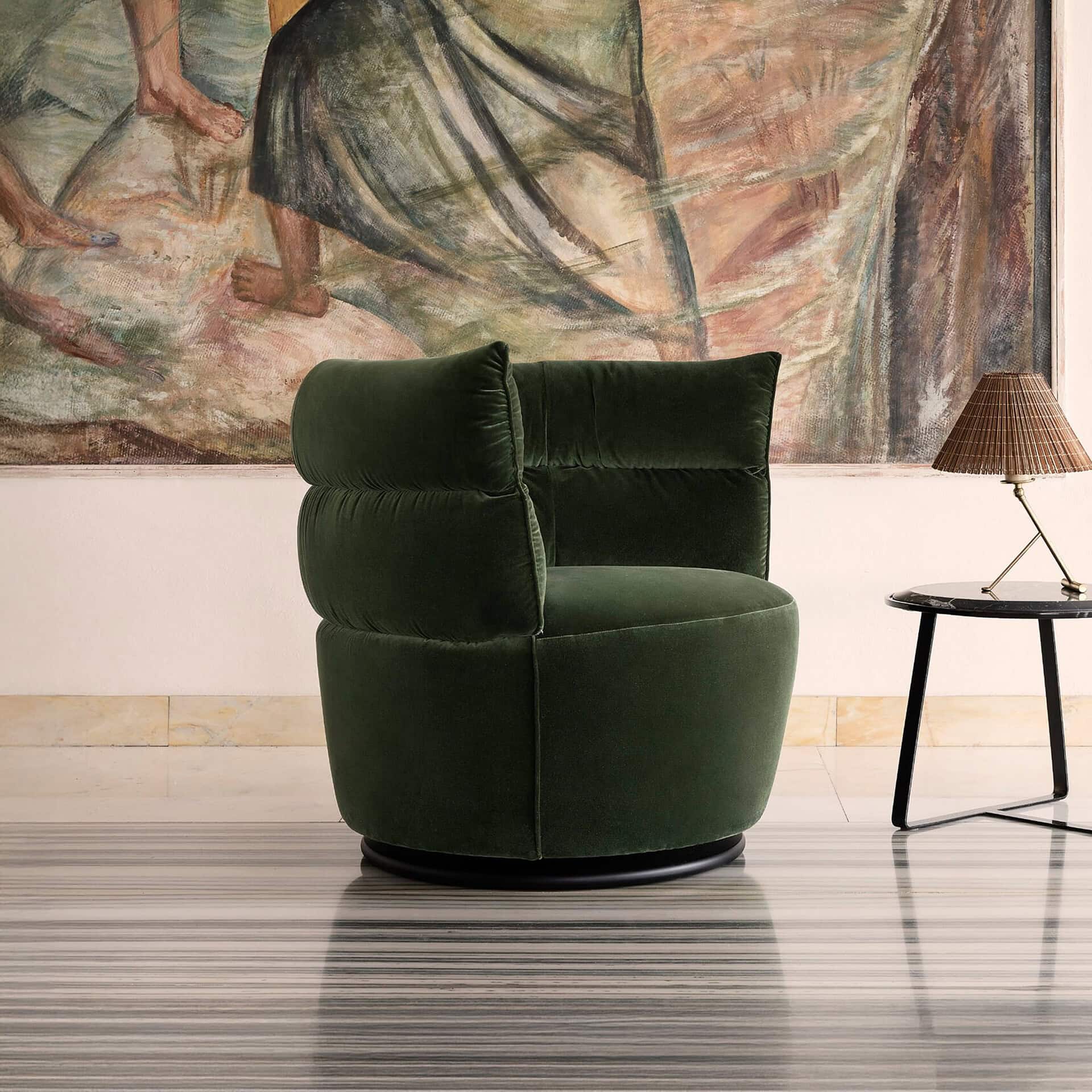 Green velvet modern armchair for stylish living rooms.